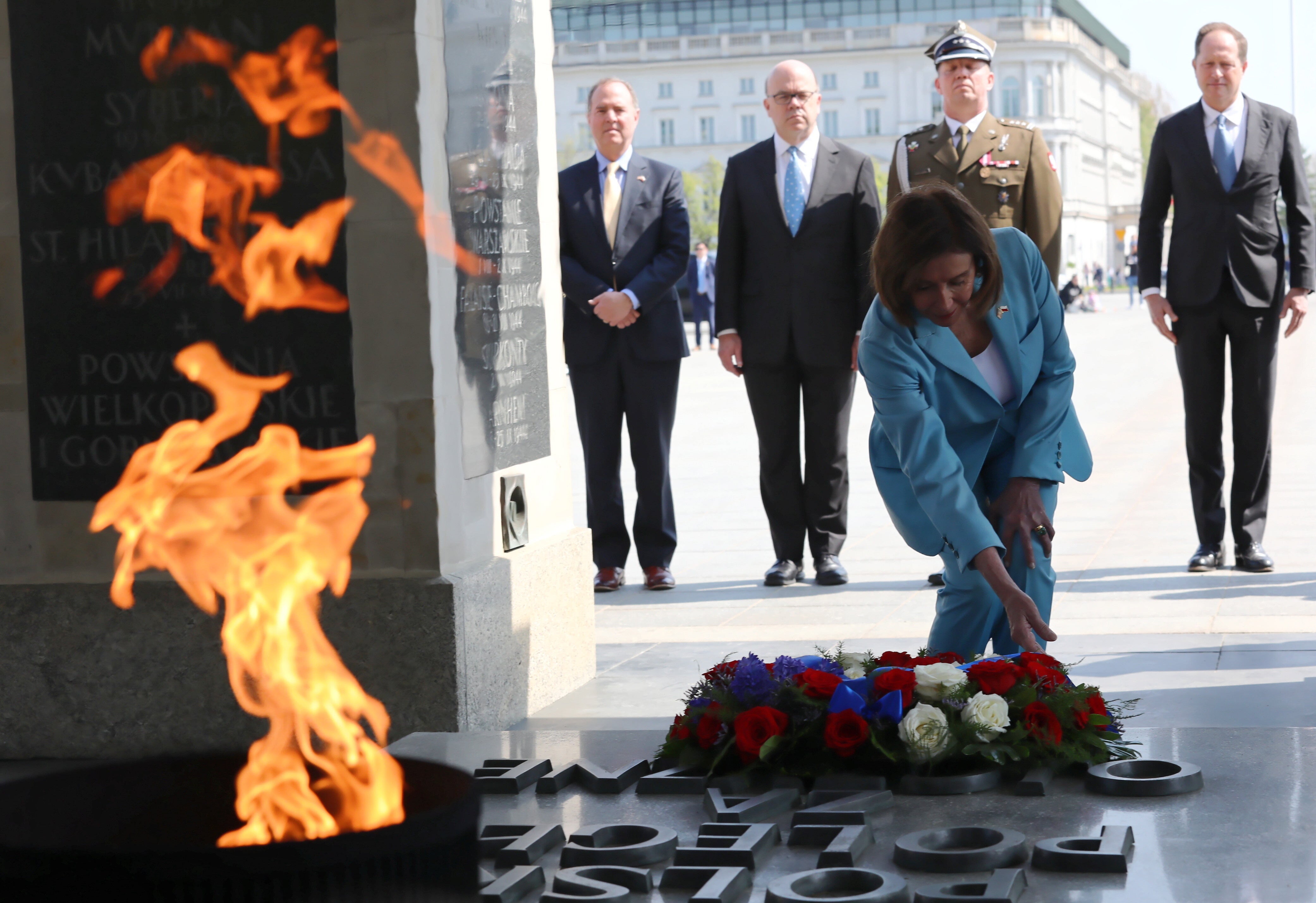 Speaker Nancy Pelosi attends a wreath laying ceremony at the Tomb of the Unknown Soldier, at Marshal Jozef Pilsudski Square in Warsaw, Poland, on 2 May 2022