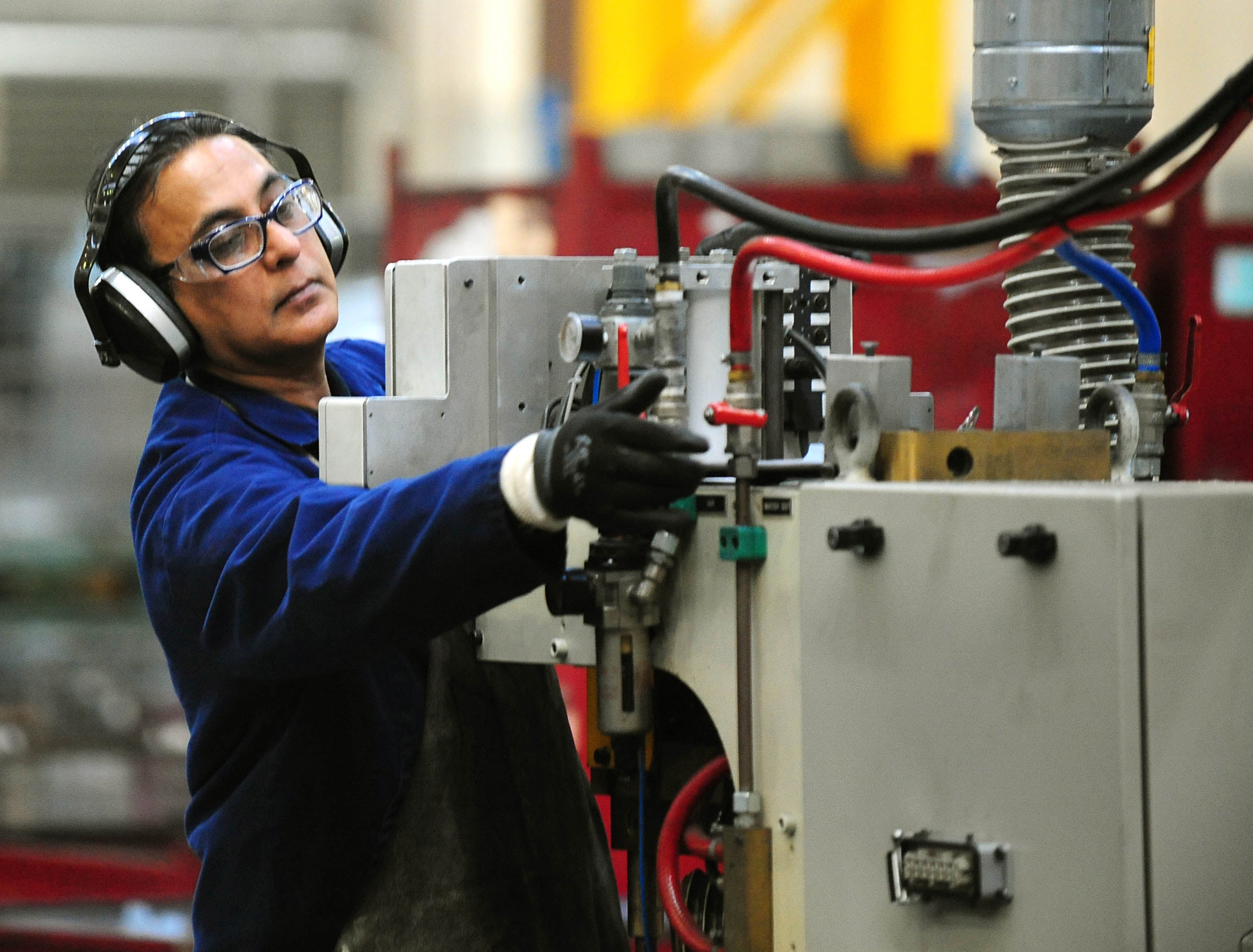 Manufacturing grew but headwinds remain, according to the latest PMIs (Rui Vieira/PA)