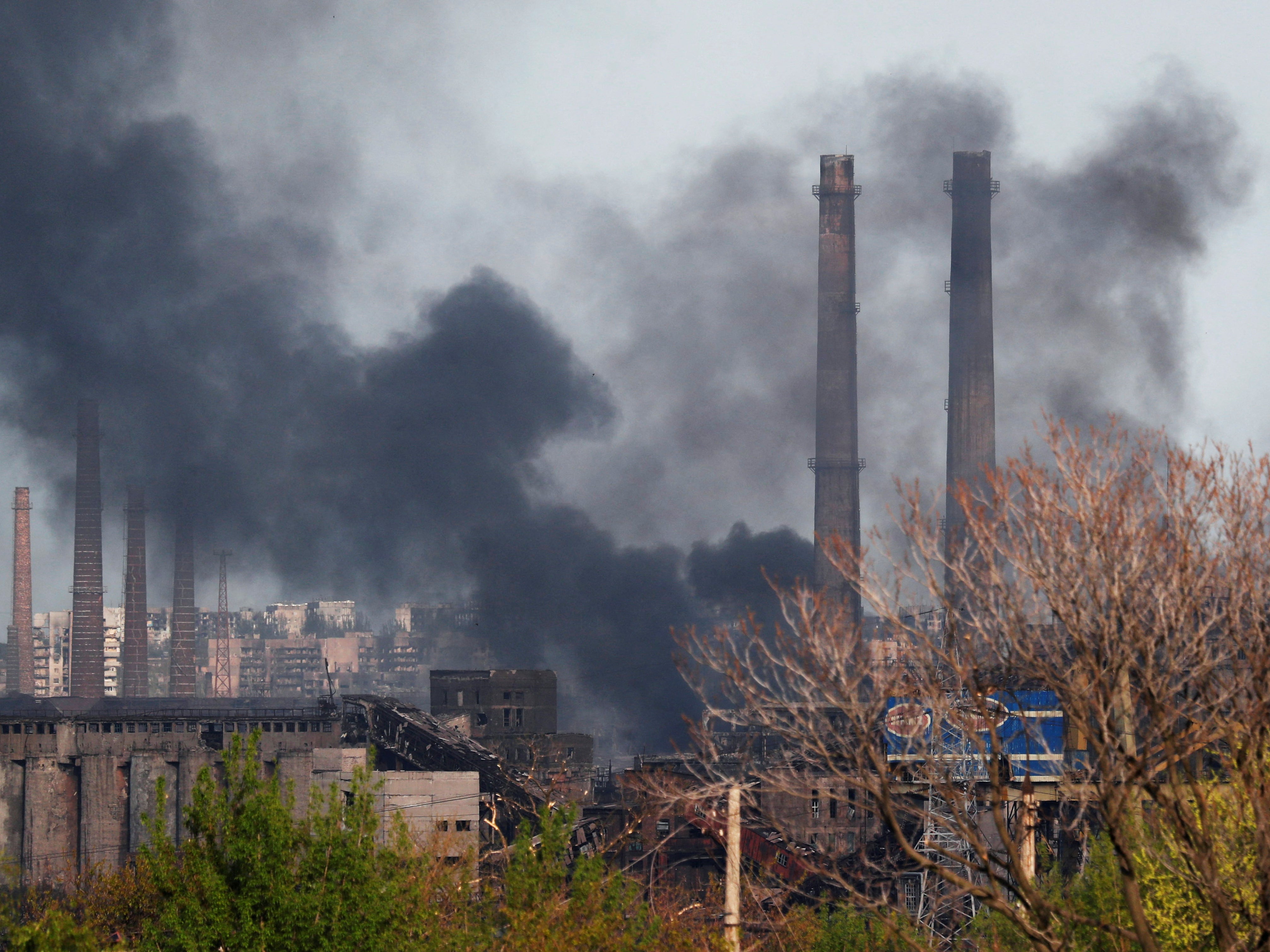 Smoke rises above a plant of Azovstal Iron and Steel Works during Ukraine-Russia conflict in the southern port city of Mariupol