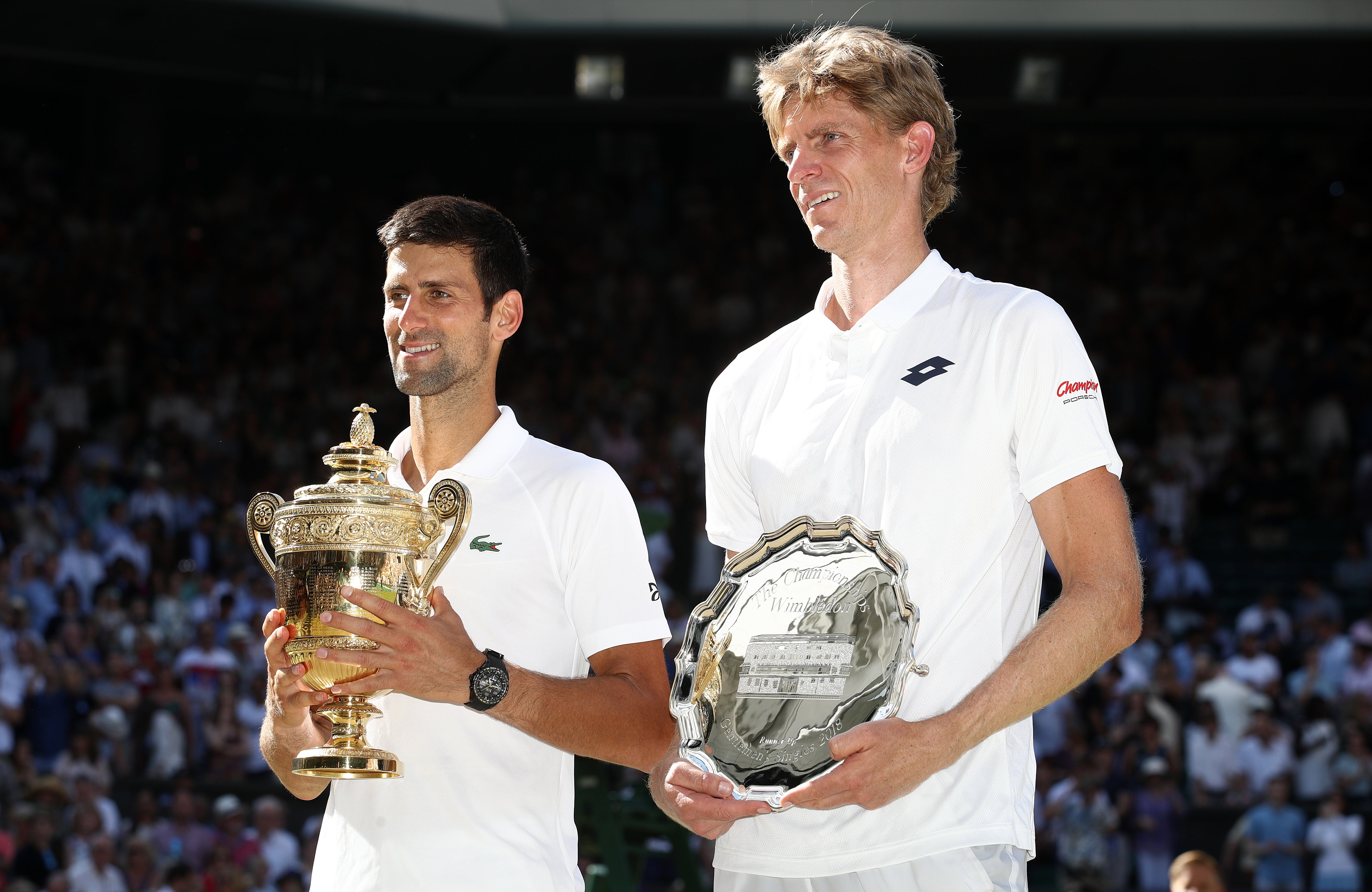 Kevin Anderson, right, was the runner-up to Novak Djokovic at Wimbledon in 2018 (John Walton/PA)