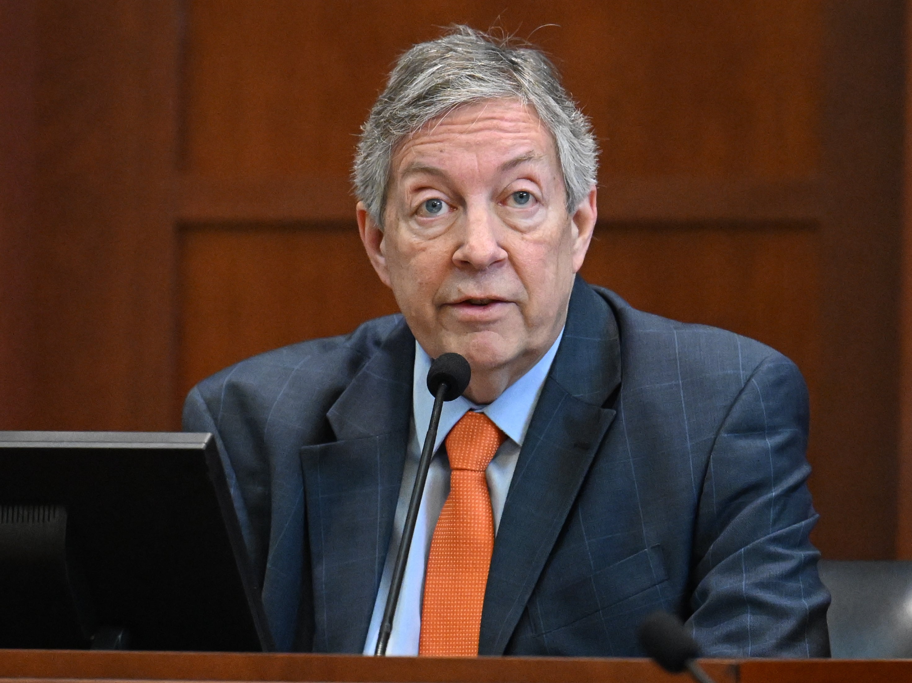 Michael Spindler, a forensic accountant, testifies in the courtroom at the Fairfax County Circuit Court in Fairfax, Virginia, USA, 3 May 2022