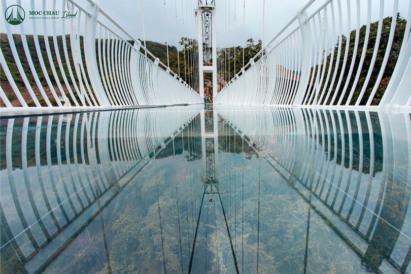 Glossy French glass stretches along the 632m bridge