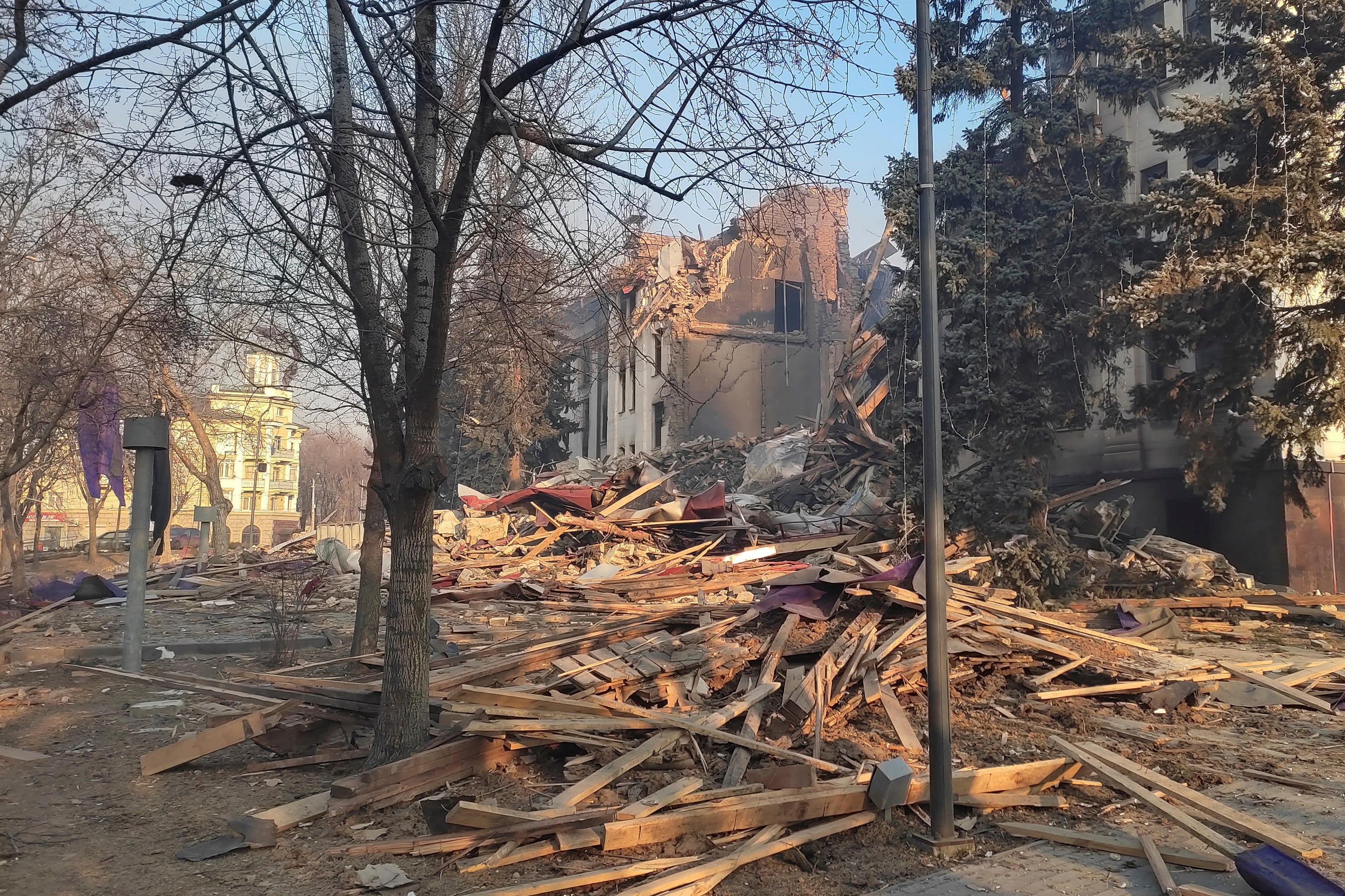 Rubble covers where the field kitchen stood outside of the Donetsk Academic Regional Drama Theatre