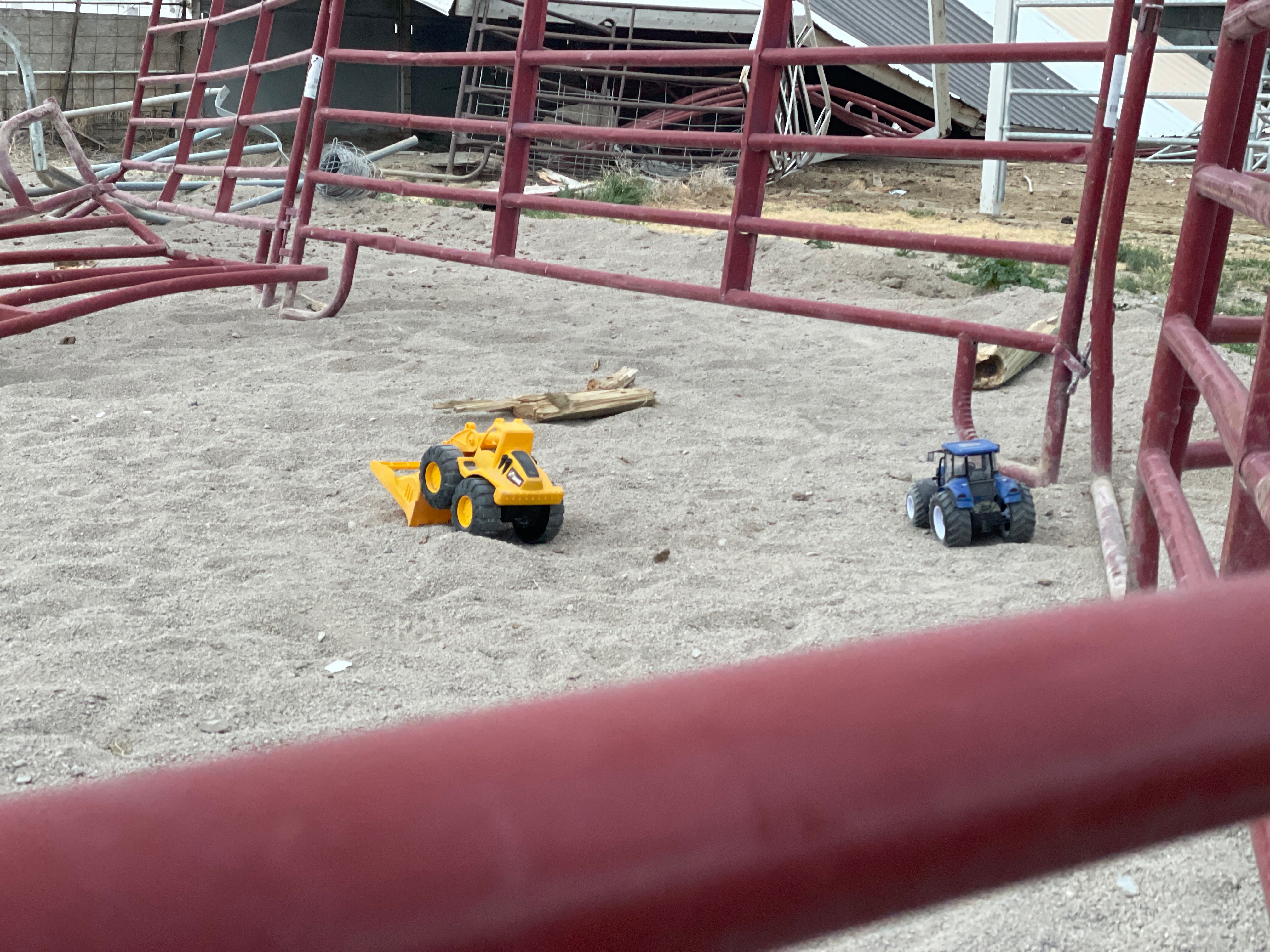 Toy trucks left behind the two victims at the scene of the crash