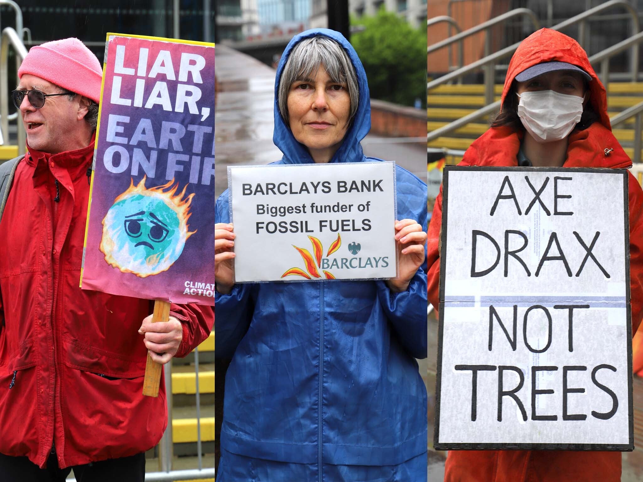 Climate activists protest outside Barclays AGM in the rain in Manchester on Wednesday