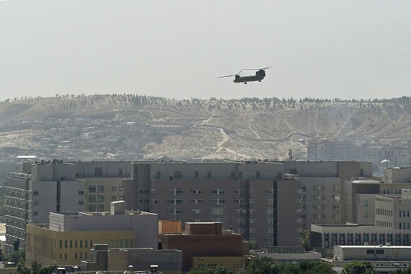 A US Chinook military helicopter flies above the US embassy in Kabul in August 2021