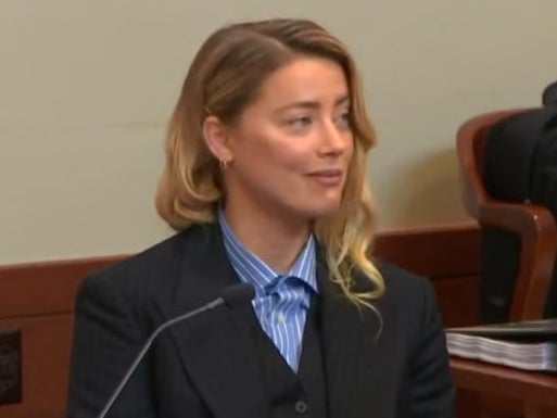 Amber Heard could be seen smiling in court during Dr Dawn Hughes’ testimony