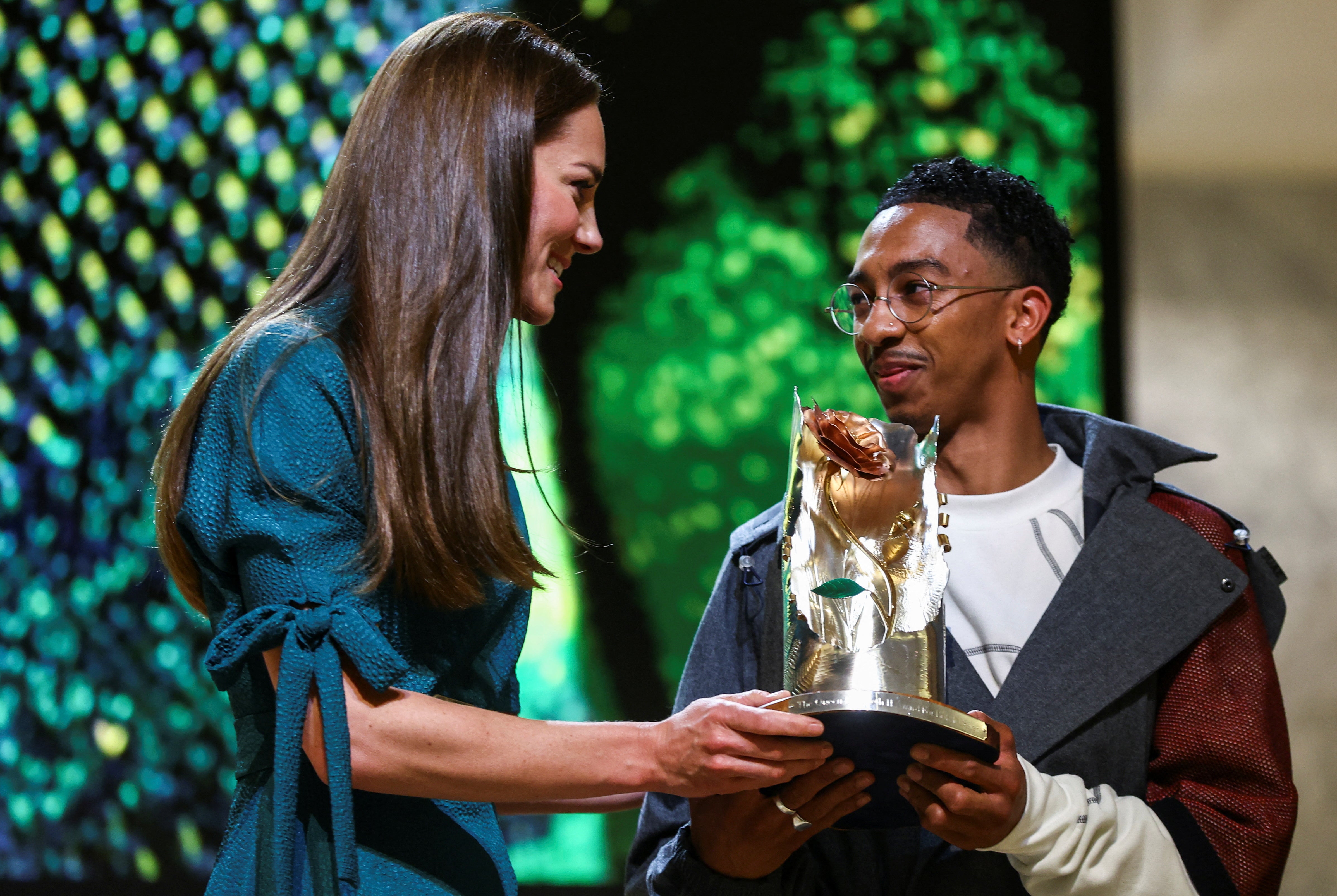 Kate presents the Queen Elizabeth II Award for British Design to Saul Nash (Hannah McKay/PA)