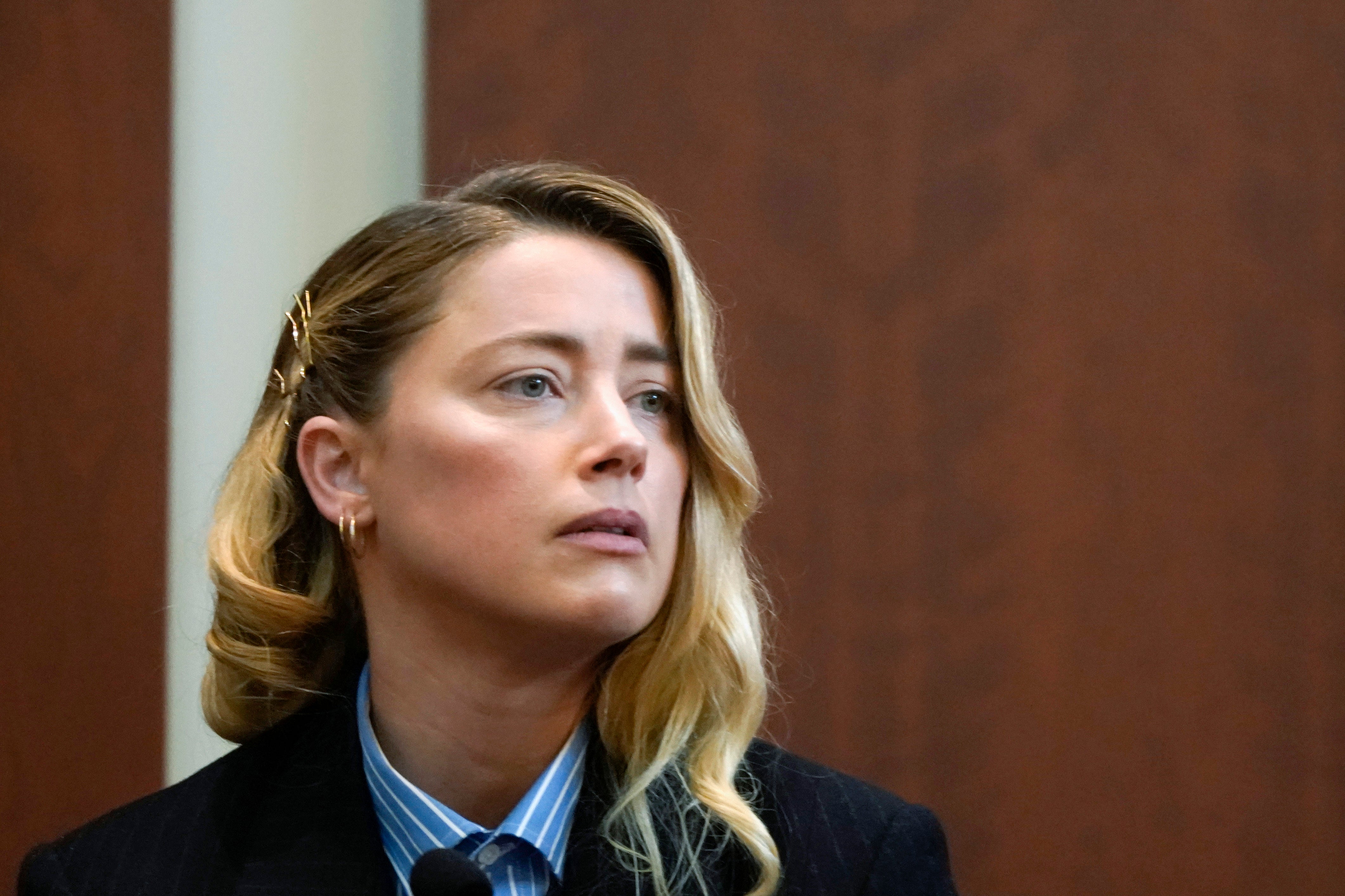 Actor Amber Heard testifies in the courtroom at the Fairfax County Circuit Court in Fairfax, Va., Wednesday May 4, 2022