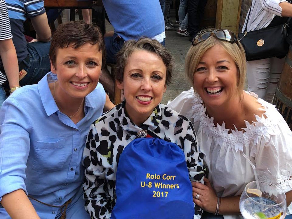 The three sisters with a bag dedicated to their late sister Rosemary, known as ‘Dodo’ (Collect/PA Real Life)