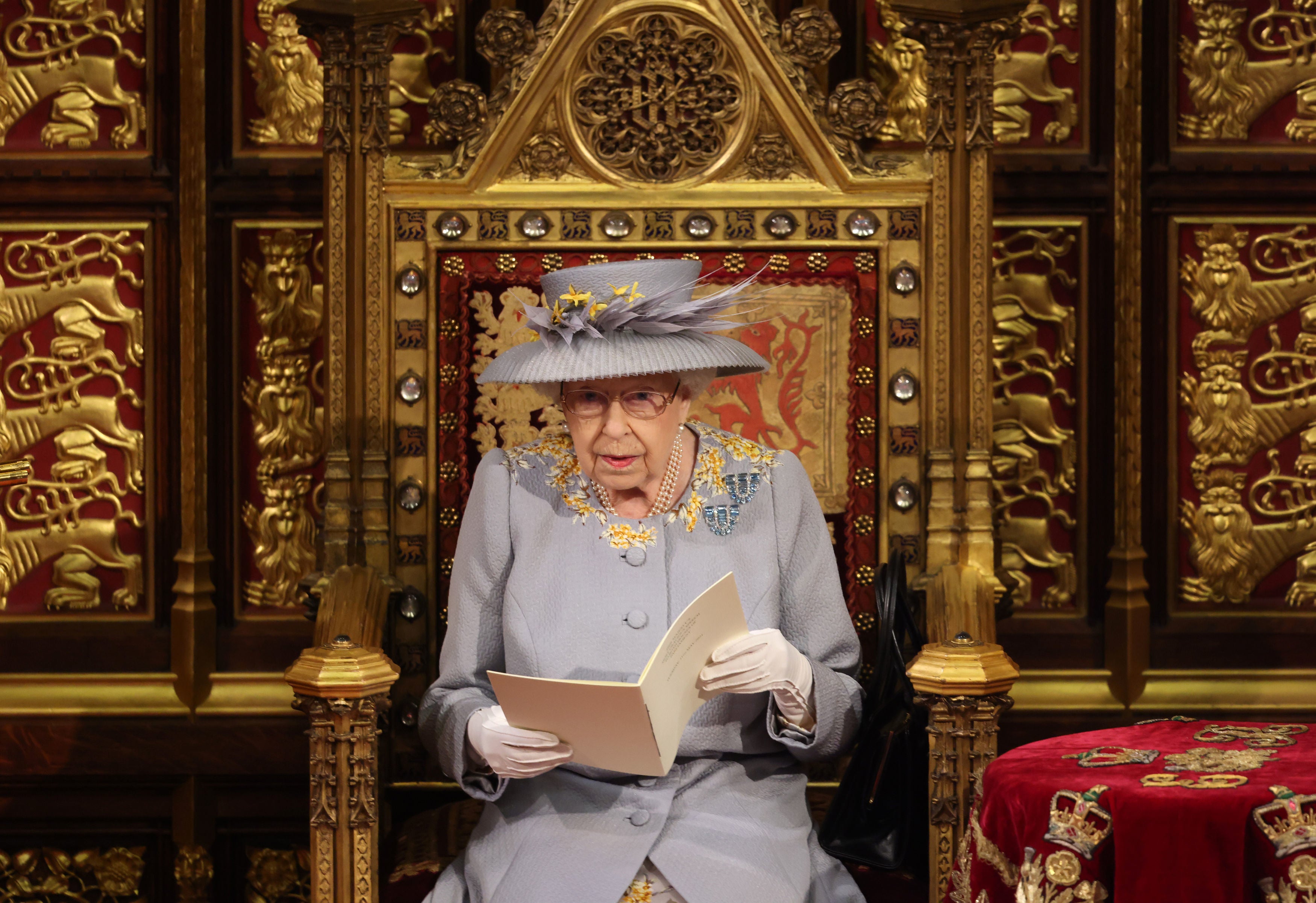The Queen delivers her speech from the House of Lords at the Palace of Westminster during the 2021 state opening of parliament