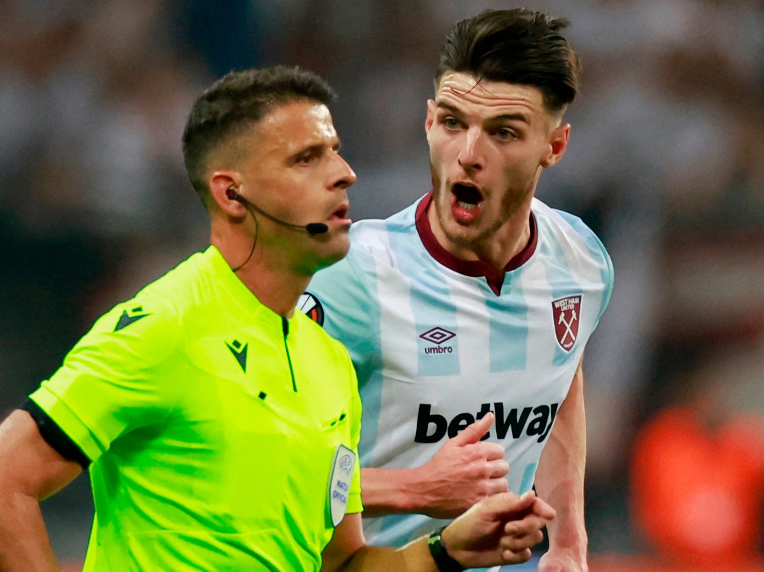 Declan Rice approaches referee Jesus Gil Manzano in Frankfurt