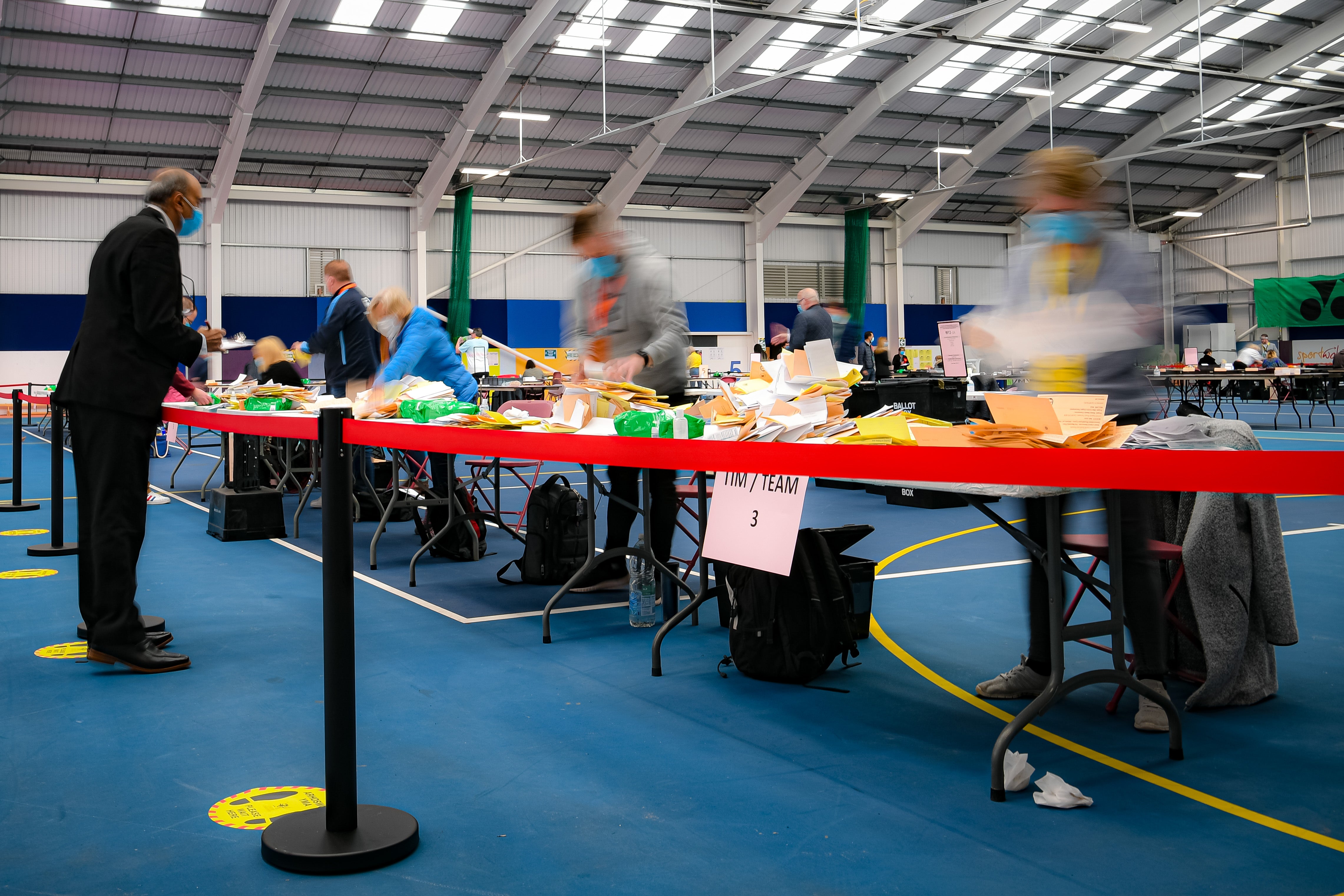 An observer watches as the count takes place of votes for the Welsh Parliamentary Elections at the Cardiff House of Sport, Cardiff (Ben Birchall/PA)