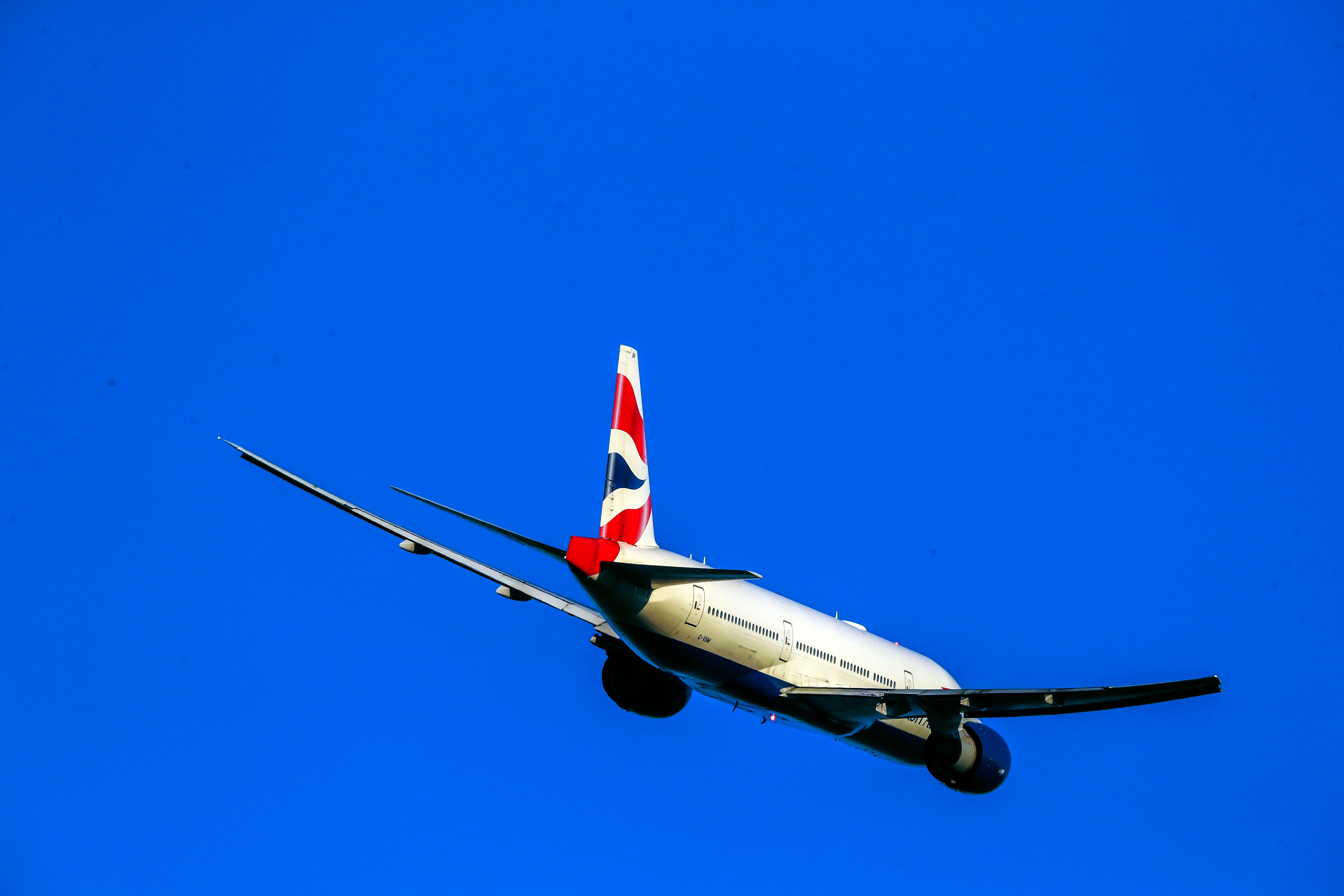 A British Airways Boeing. Travel firms dropped lower on Friday after heavy losses by BA owner IAG (Steve Parsons/PA)