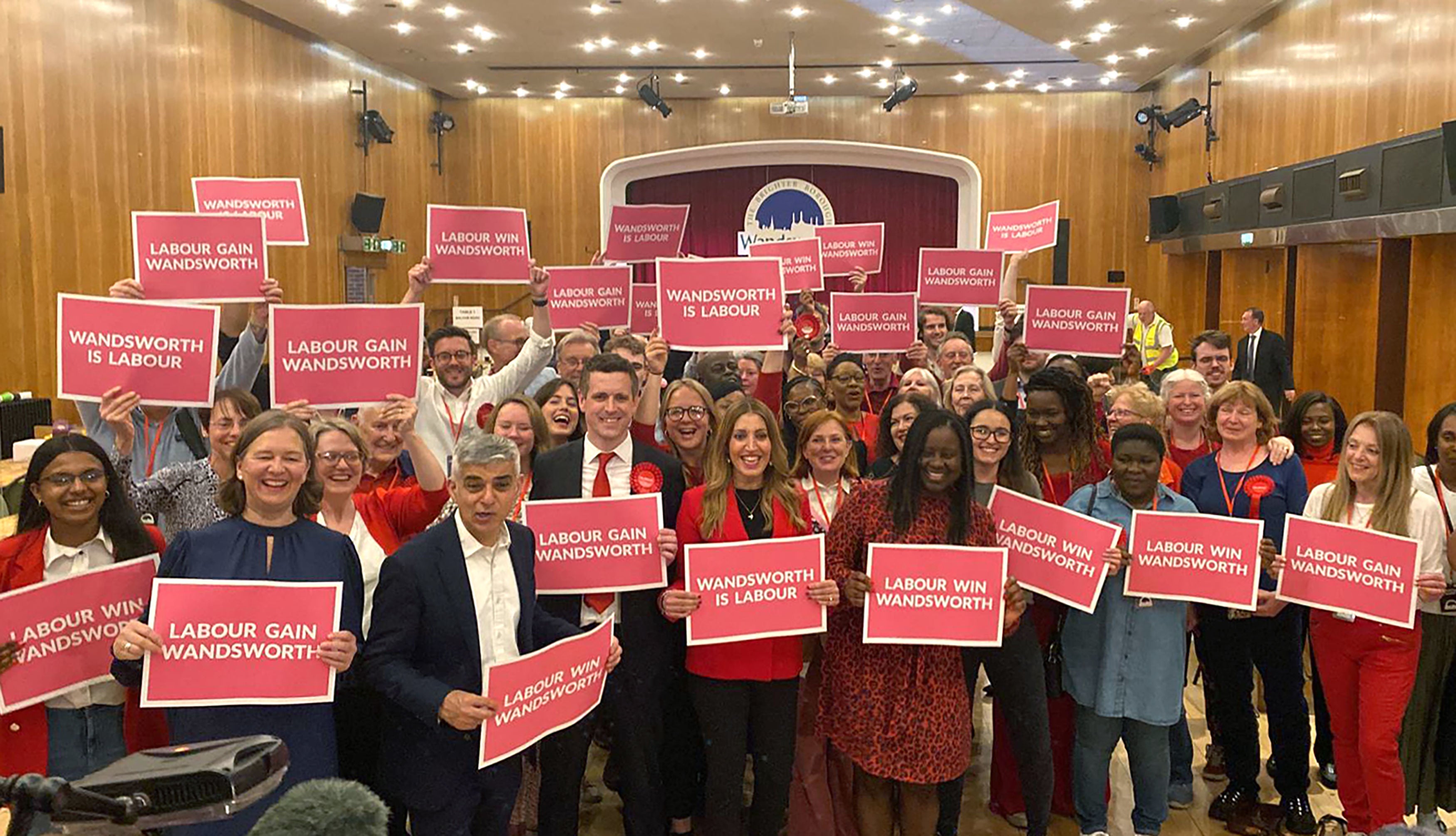 Mayor of London Sadiq Khan and other Labour supporters celebrate the party’s victory in Wandsworth