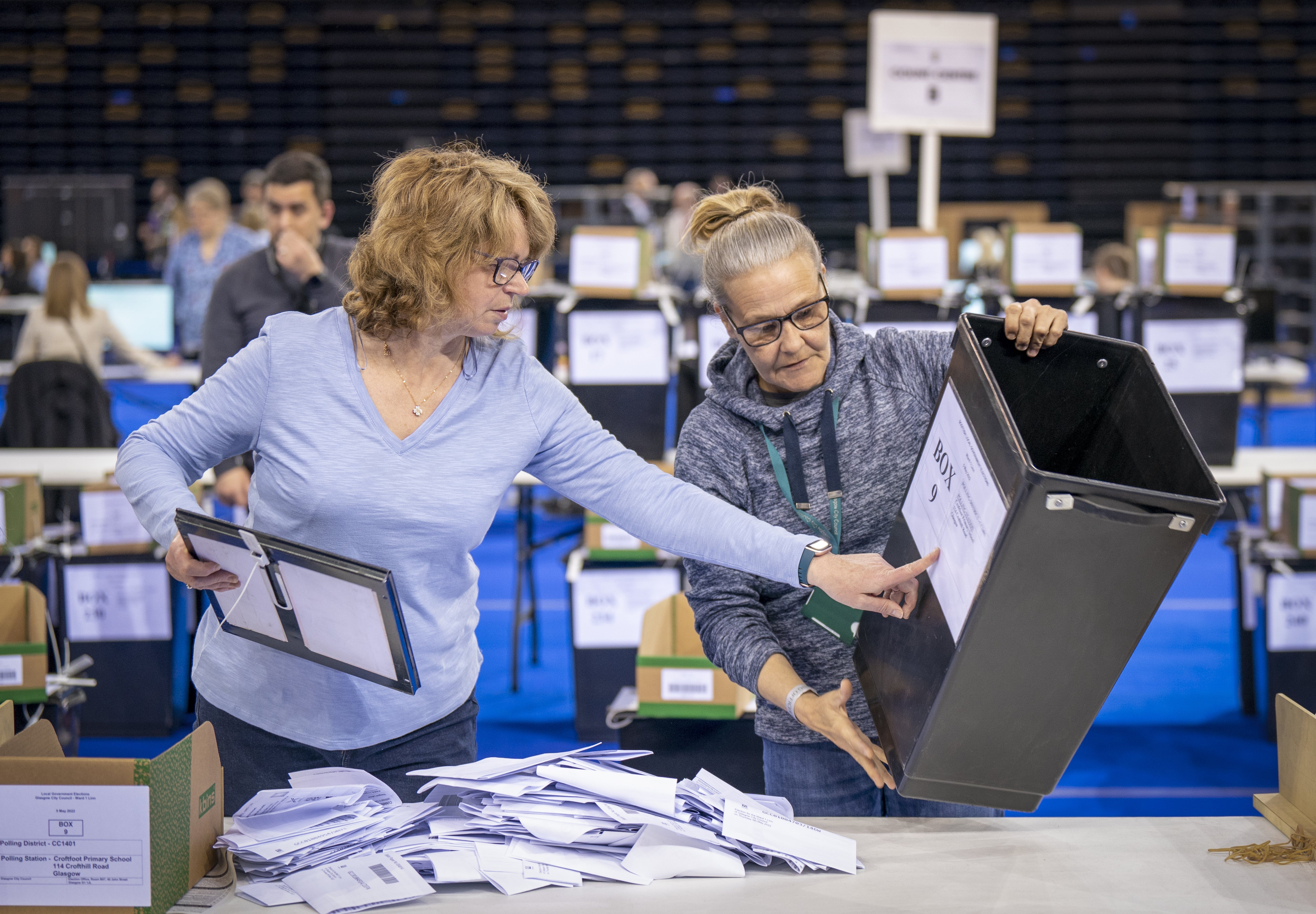 Votes are sorted at the Glasgow City Council count at the Emirates Arena (Jane Barlow/PA)