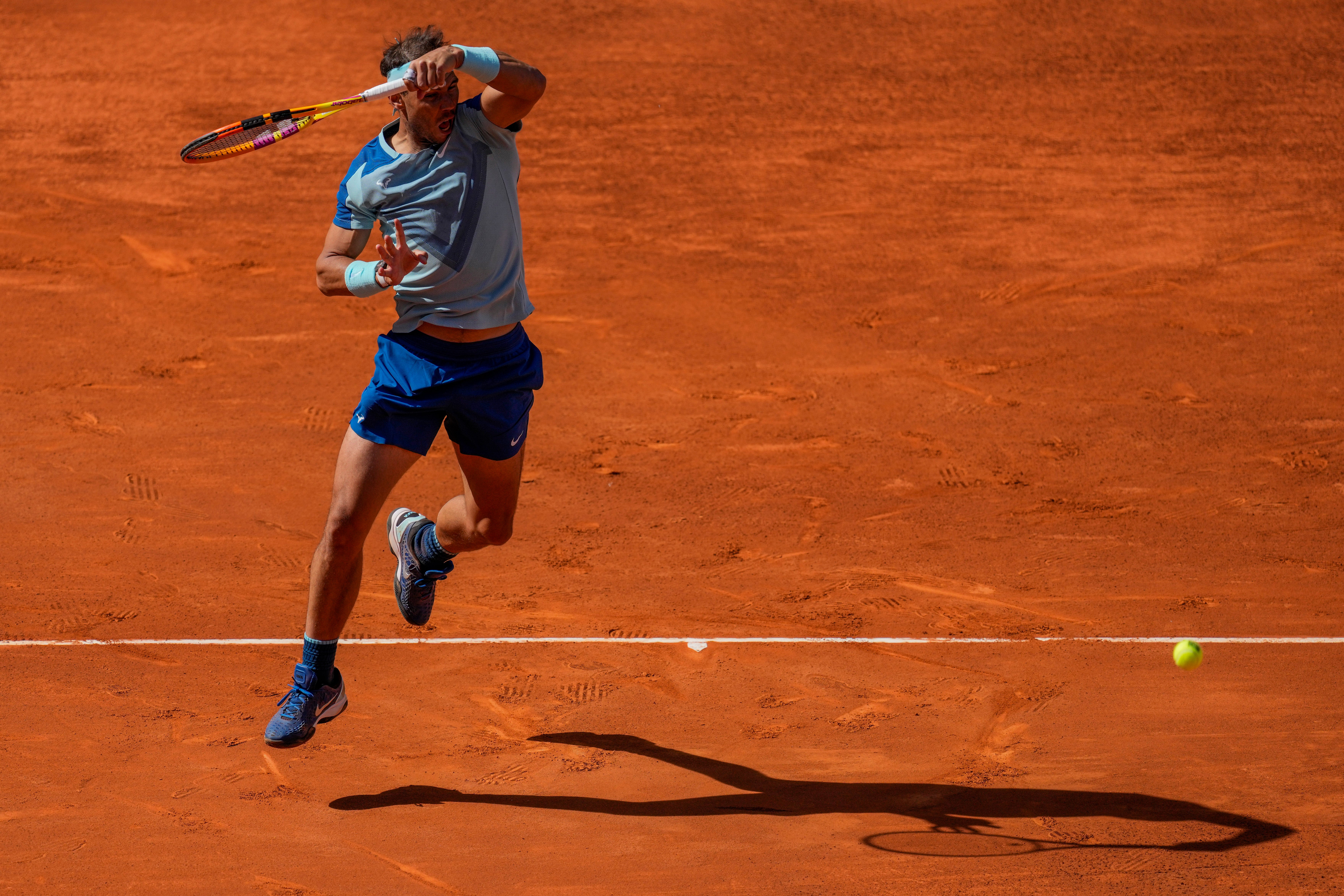 Rafael Nadal whips a forehand during his defeat by Carlos Alcaraz (Bernat Armangue/AP)