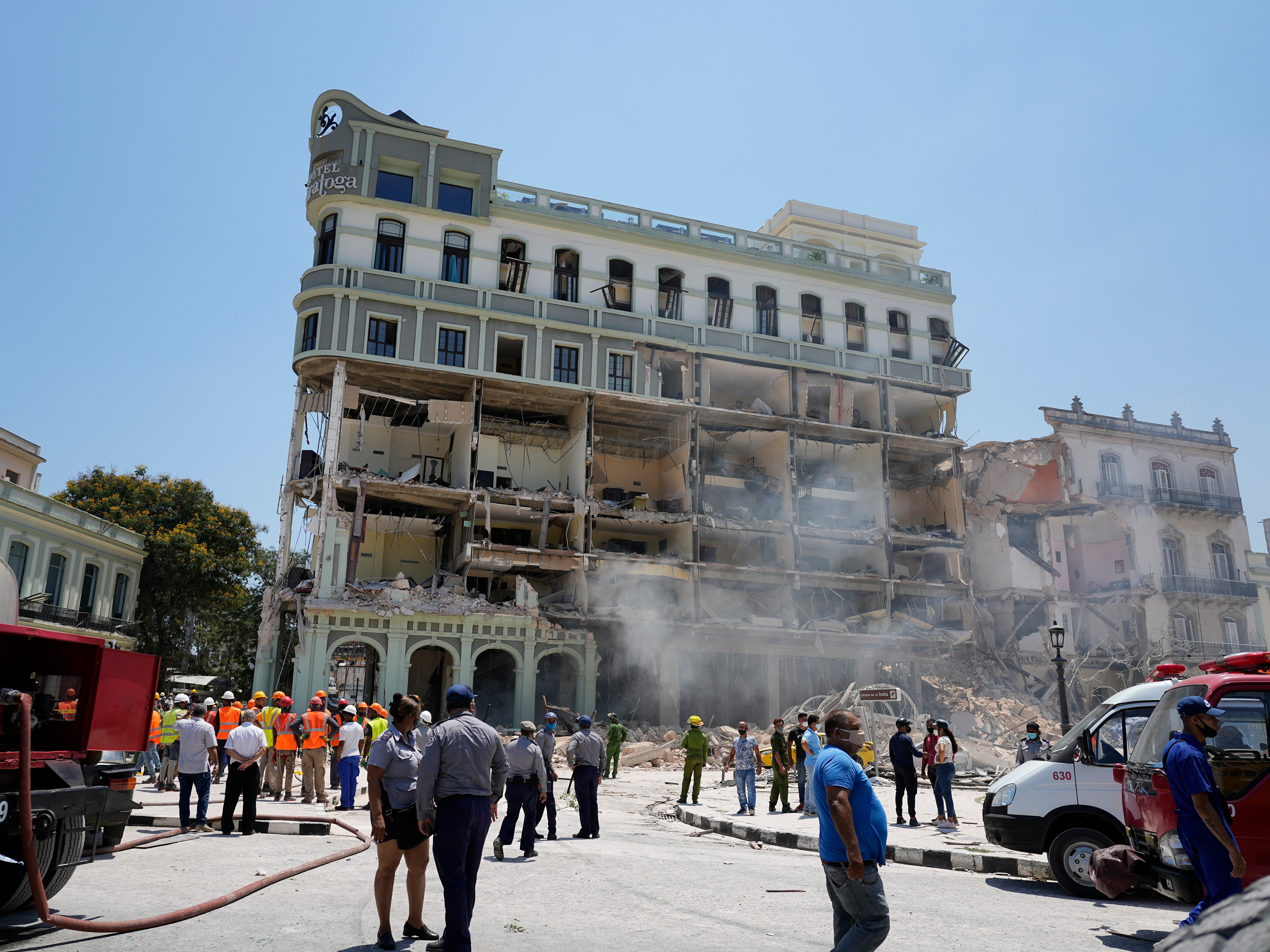 Rooms are exposed at the five-star Hotel Saratoga where emergency crew work after a deadly explosion in Old Havana, Cuba, Friday, May 6, 2022