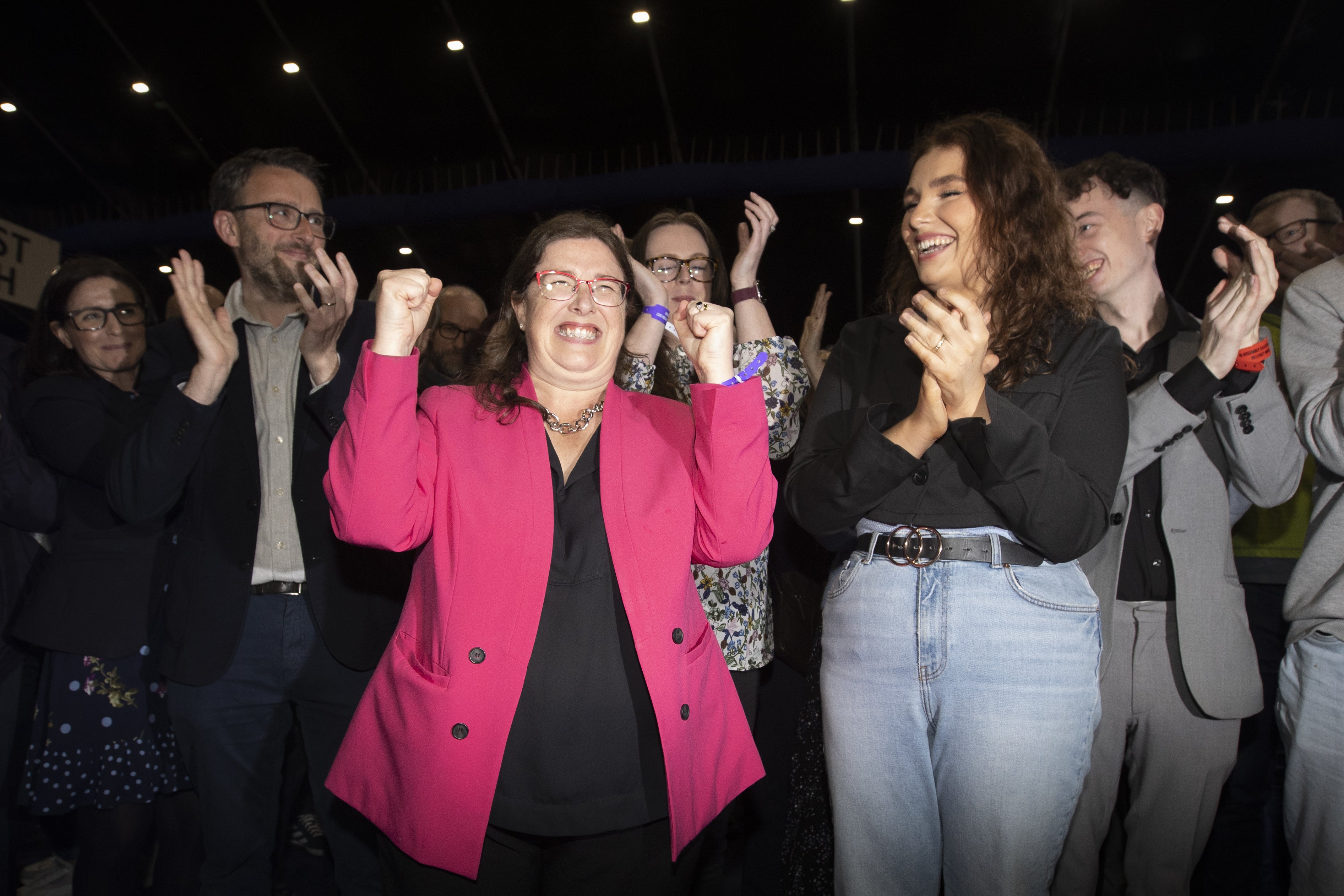 Kellie Armstrong celebrates with supporters (Liam McBurney/PA)