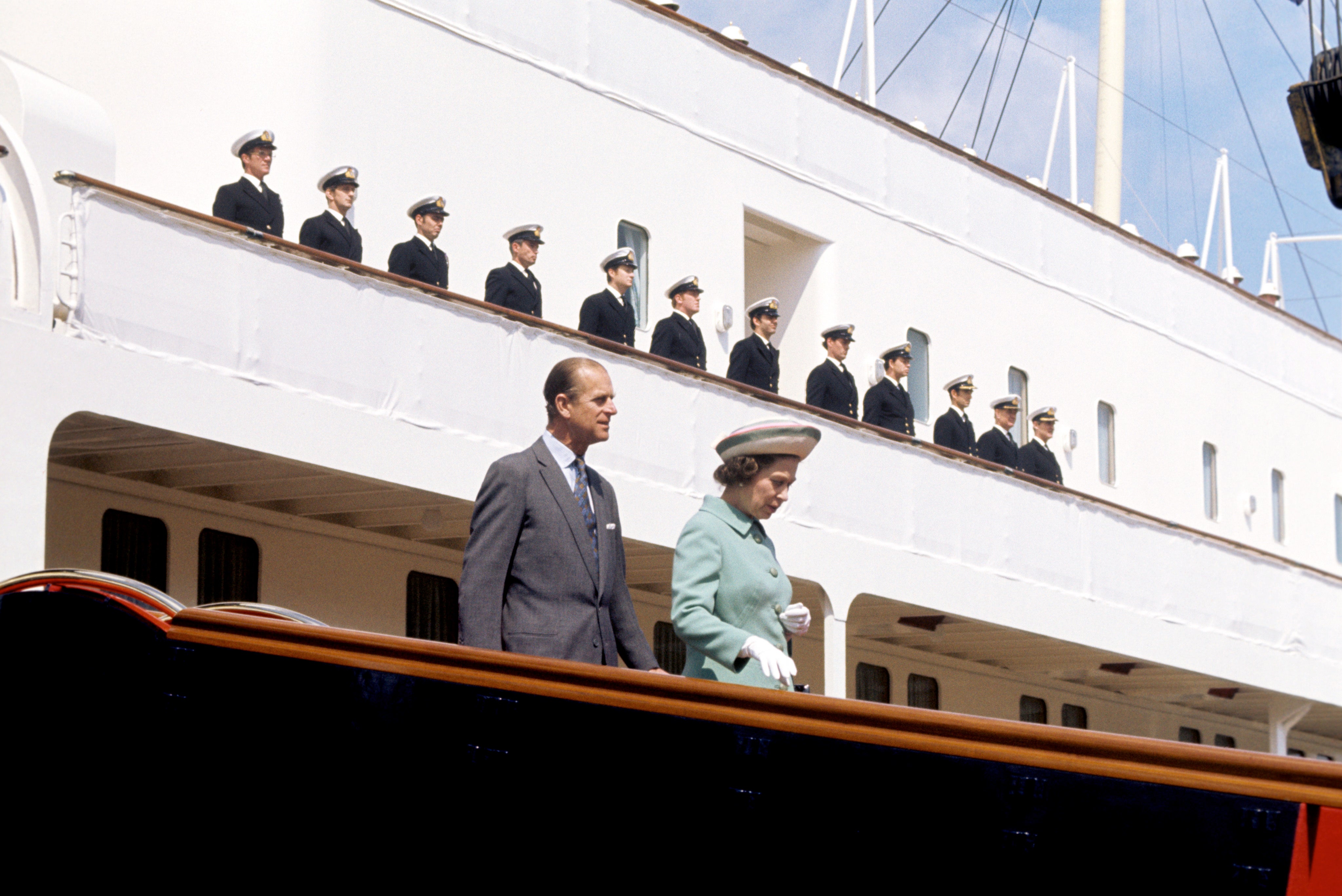 The Queen and the Duke of Edinburgh disembarking from the Royal Yacht Britannia in Portsmouth Dockyard
