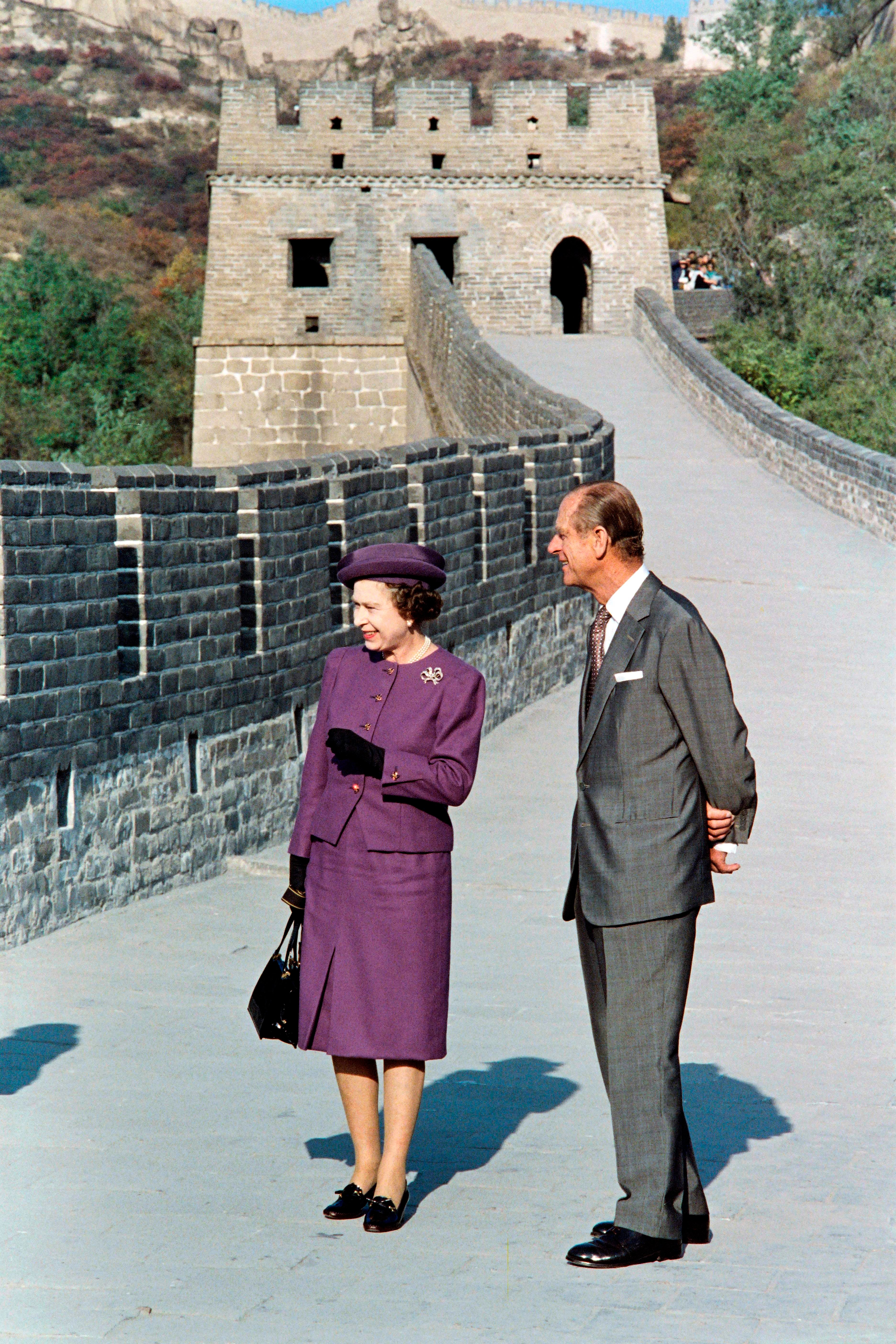 Queen Elizabeth II and Prince Philip, Duke of Edinburgh visit the Great Wall of China on October 1986