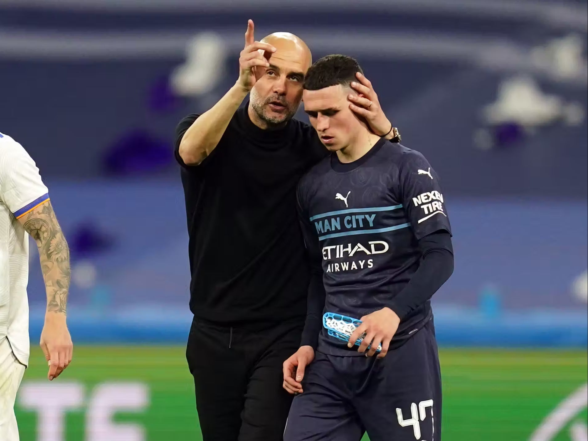 Pep Guardiola (left) expects a response from his players after their Champions League exit (Nick Potts/PA)