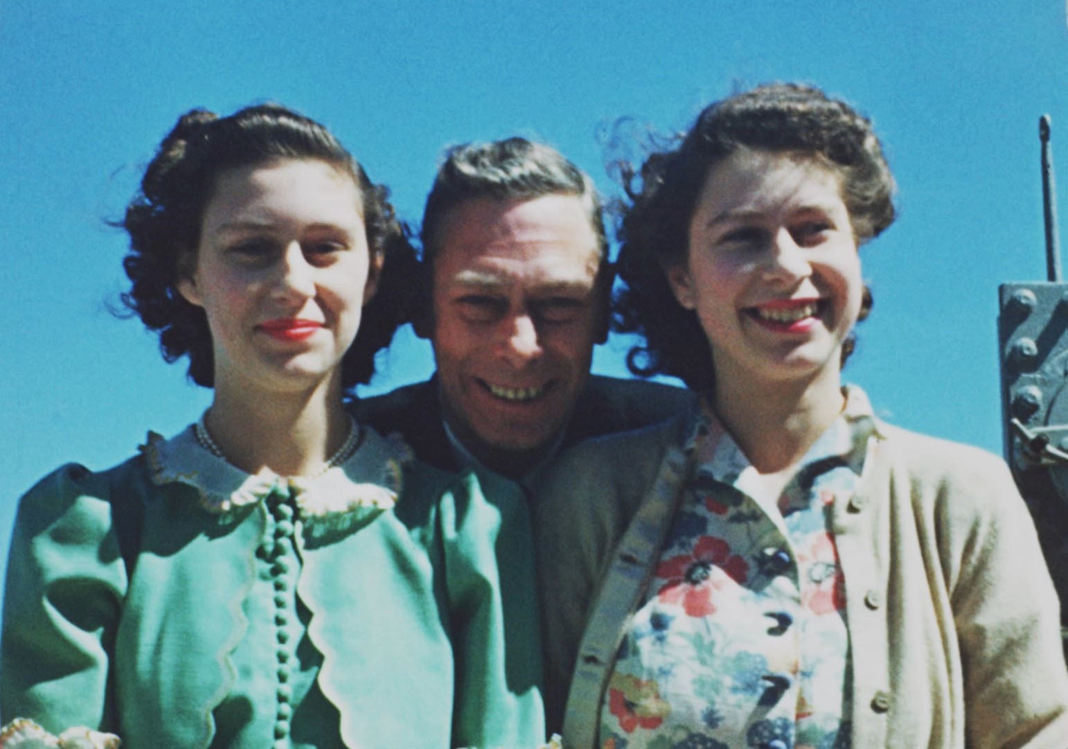 Princess Margaret and Princess Elizabeth with their father King George VI onboard HMS Vanguard in 1947