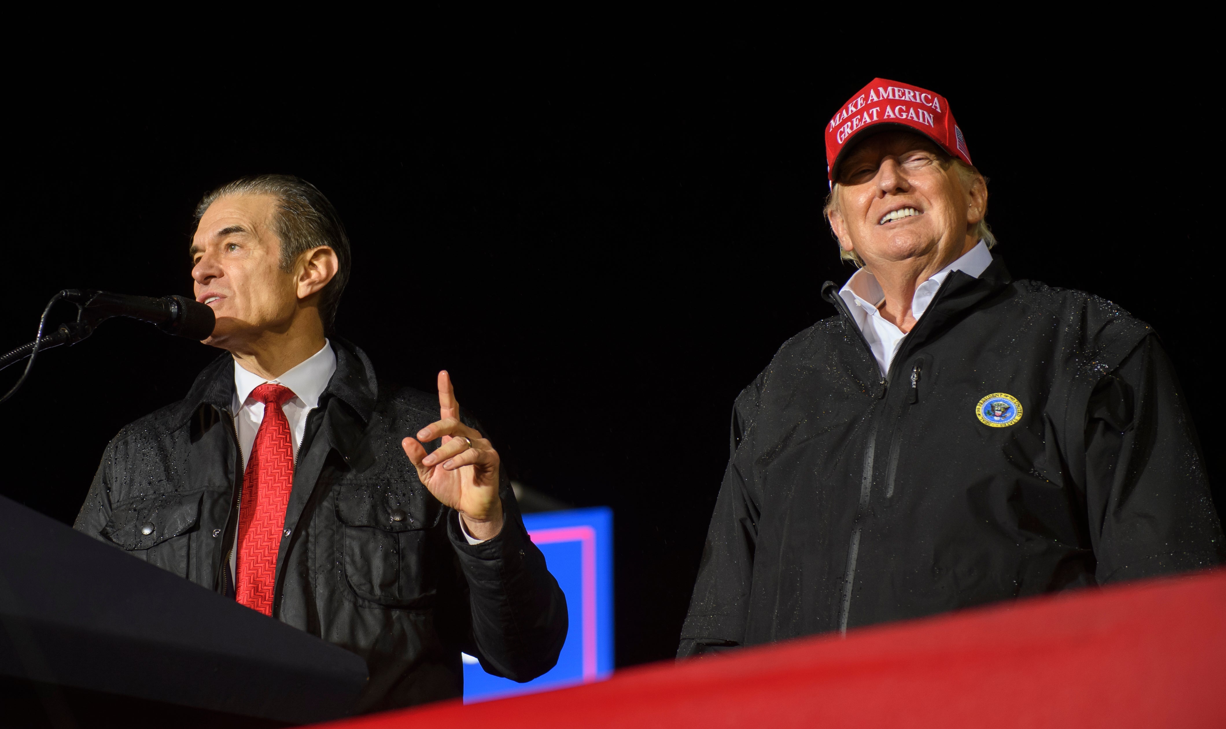 Pennsylvania Republican U.S. Senate candidate Dr Mehmet Oz joins former President Donald Trump onstage during a rally in support of his campaign at the Westmoreland County Fairgrounds on May 6