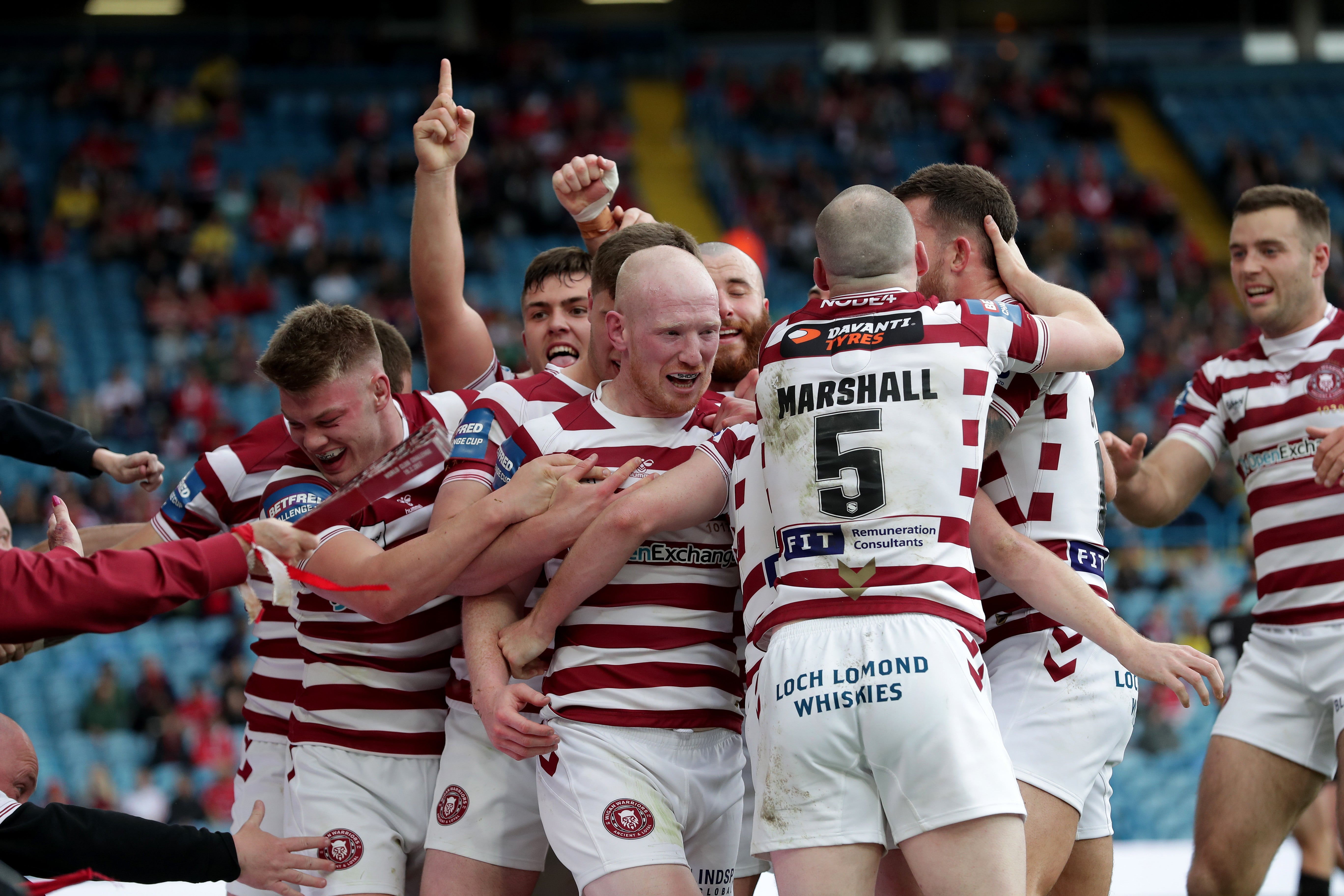 Liam Farrell (centre) crossed over in Wigan’s victory (Richard Sellers/PA)