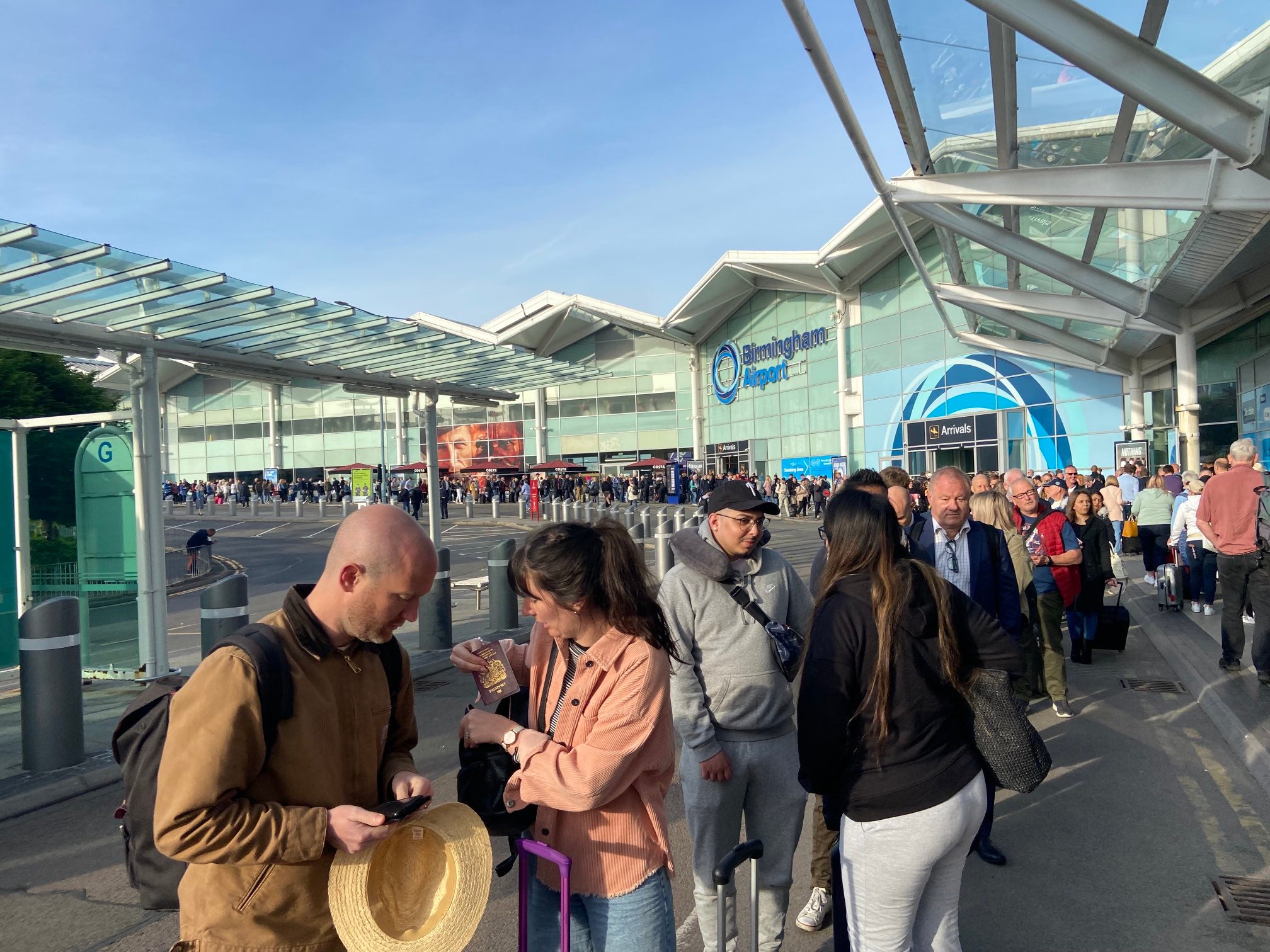 There were long queues outside Birmingham Airport (@BobBlack1964 on Twitter/PA)