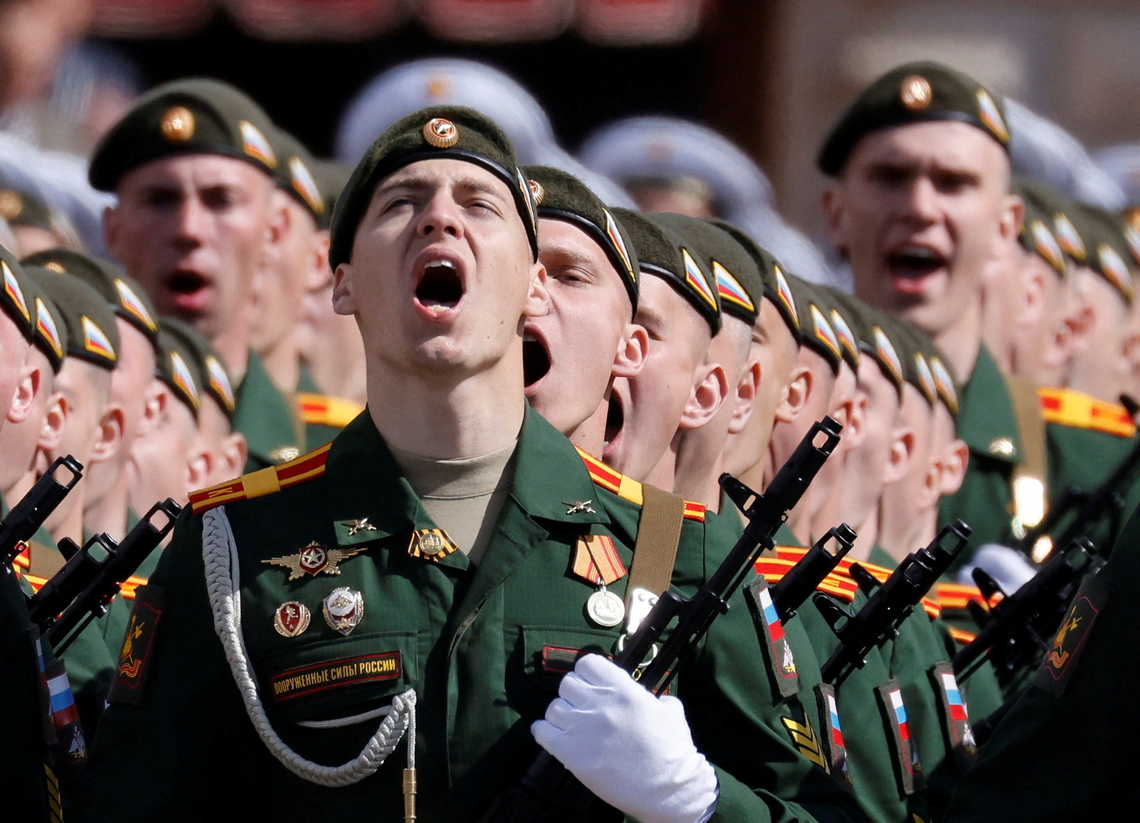 Russian service members take part in a military parade on Victory Day