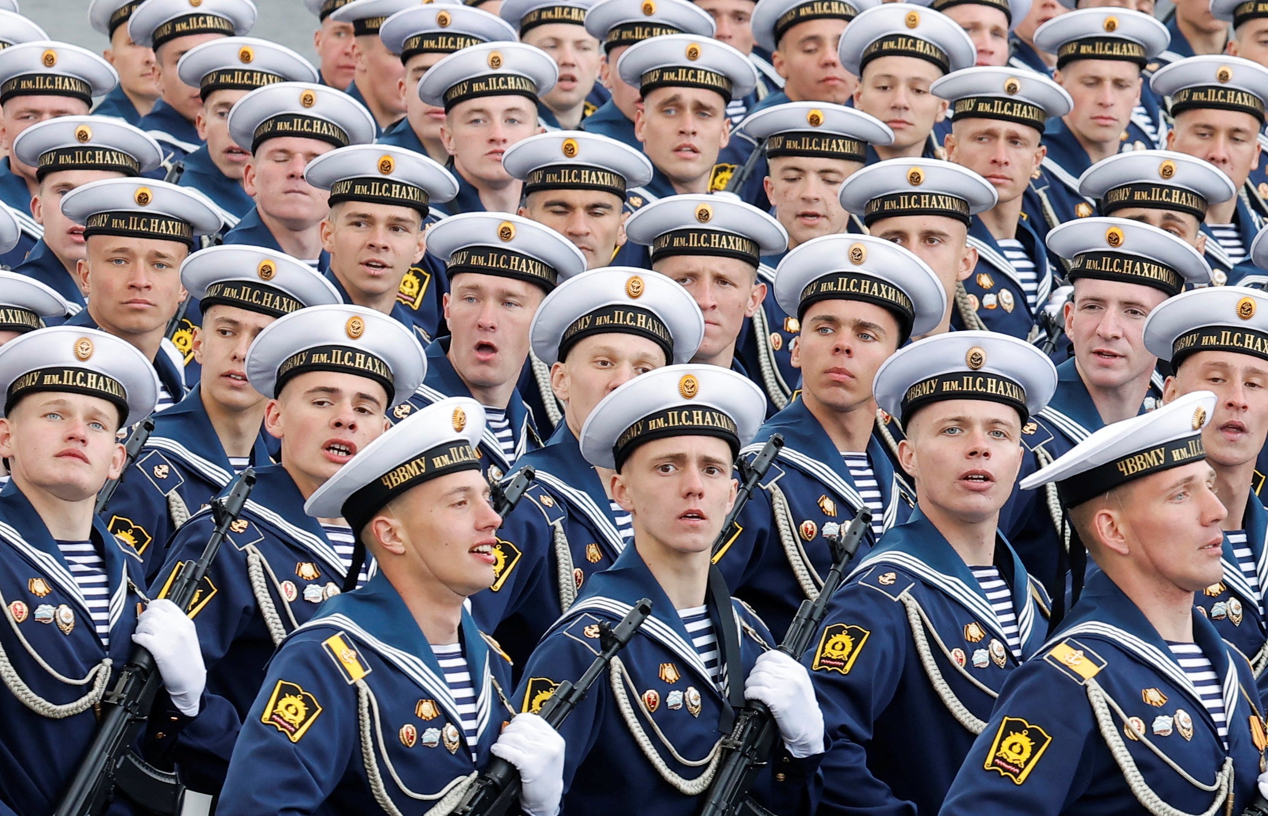 Russian navy sailors march during a military parade on Victory Day