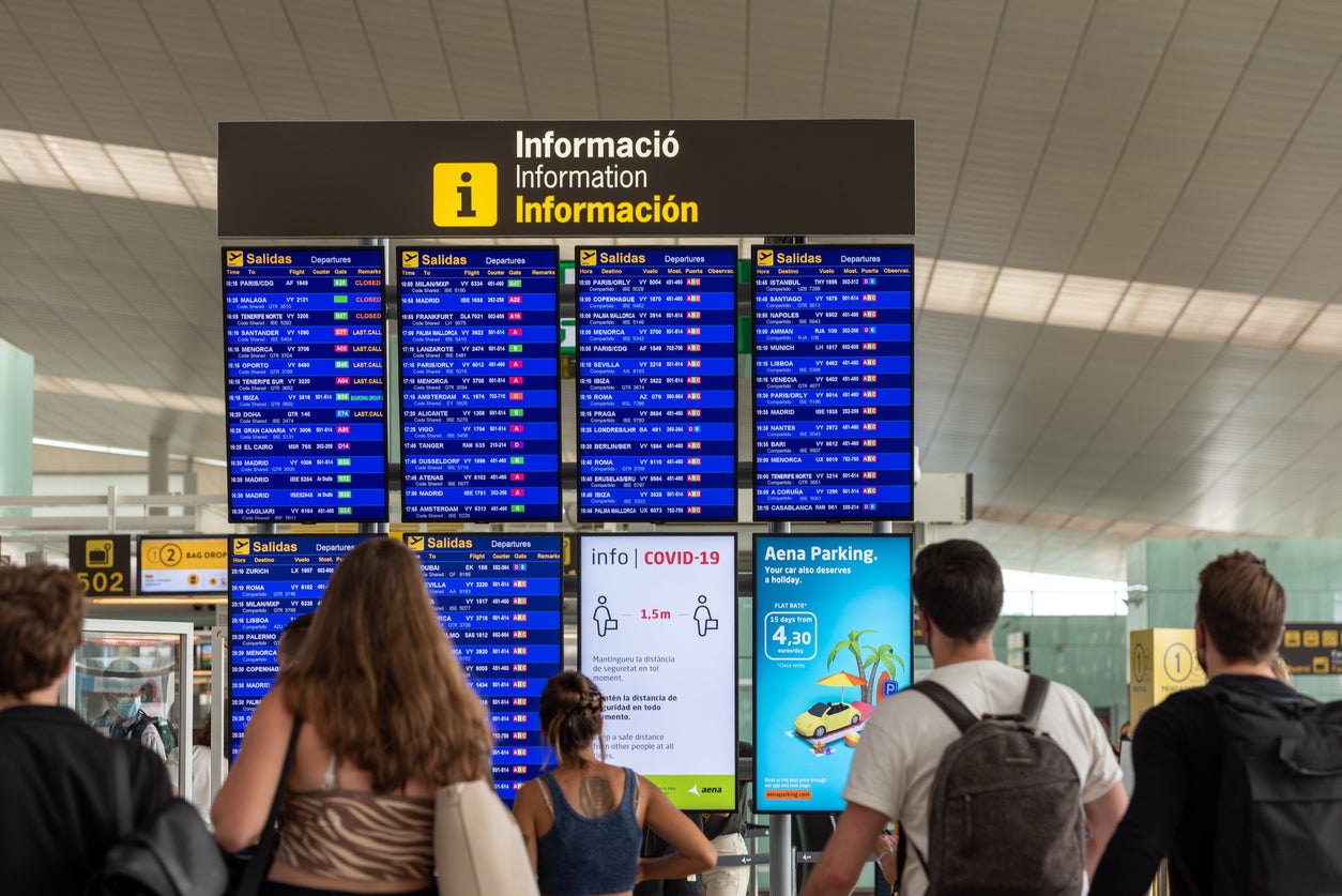 Holidaymakers waiting at Barcelona El Prat airport