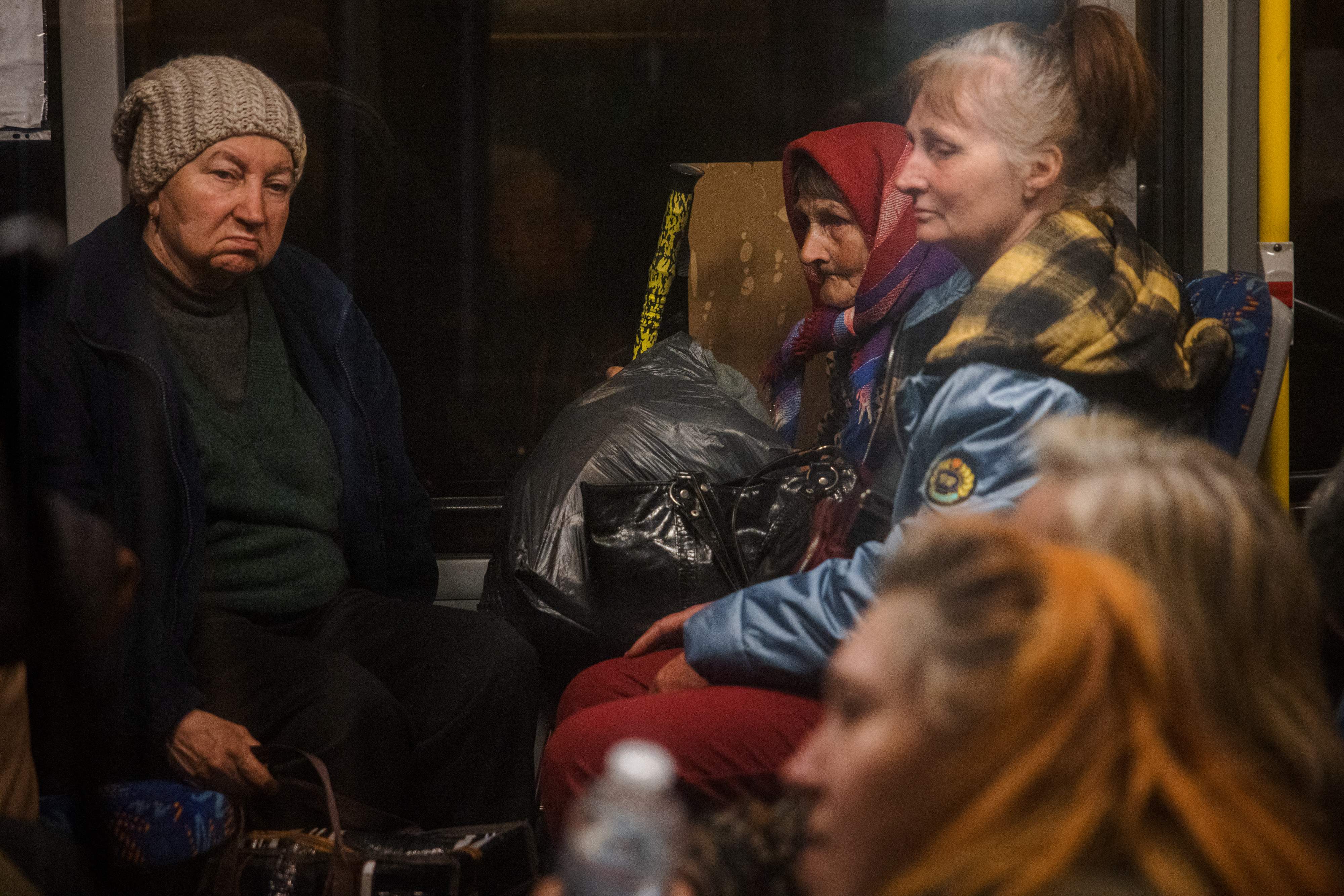 eople evacuated from Mariupol arrive on buses at a registration and processing area for internally displaced people in Zaporizhzhia