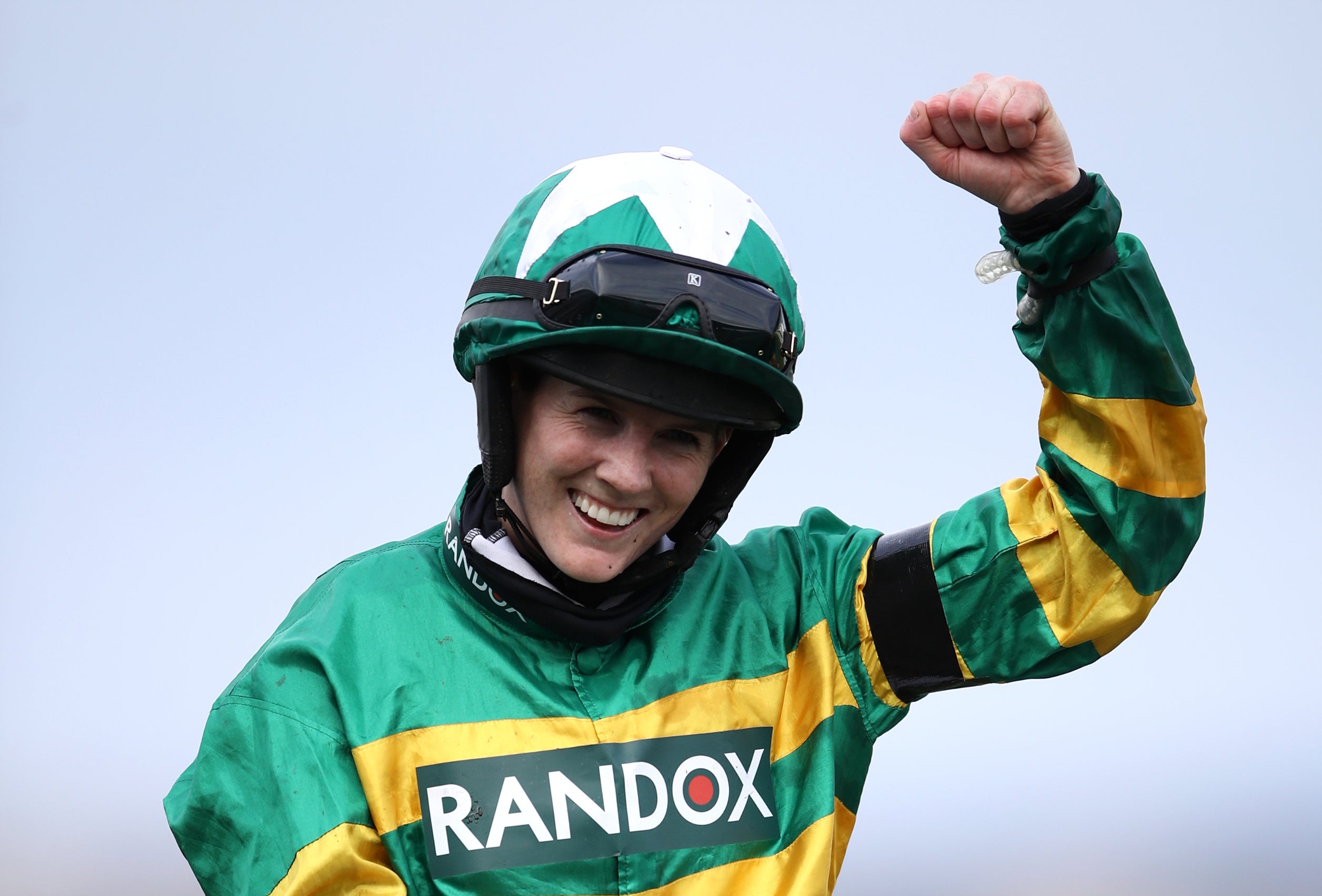 Rachael Blackmore celebrates on Minella Times after winning the 2021 Randox Grand National (Tim Goode/PA)