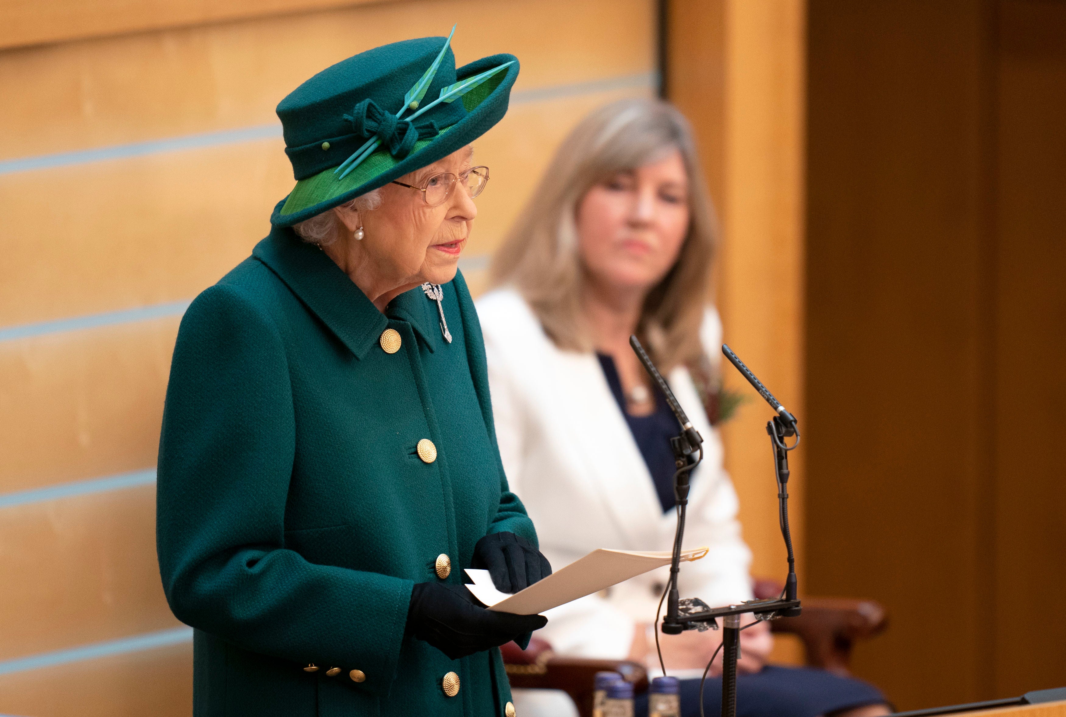 Britain’s Queen Elizabeth II delivers a speech in the debating chamber of the Scottish Parliament in Edinburgh on 2 October 2021 in Edinburgh