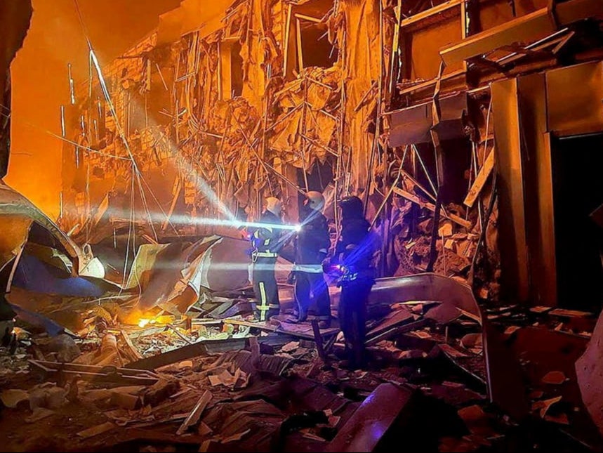 First responders work at the site of a missile strike, amid Russia's invasion of Ukraine, in Odesa, Ukraine in this handout image released May 10, 2022