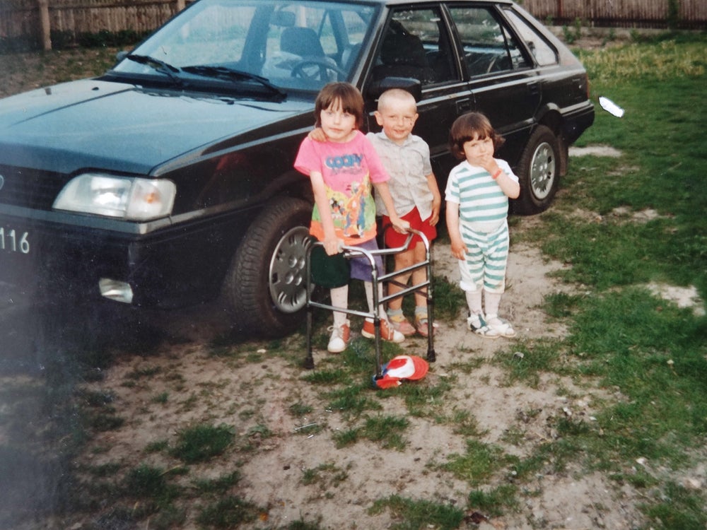 Joanna using her walker alongside her cousin and sister, Anna (Collect/PA Real Life)