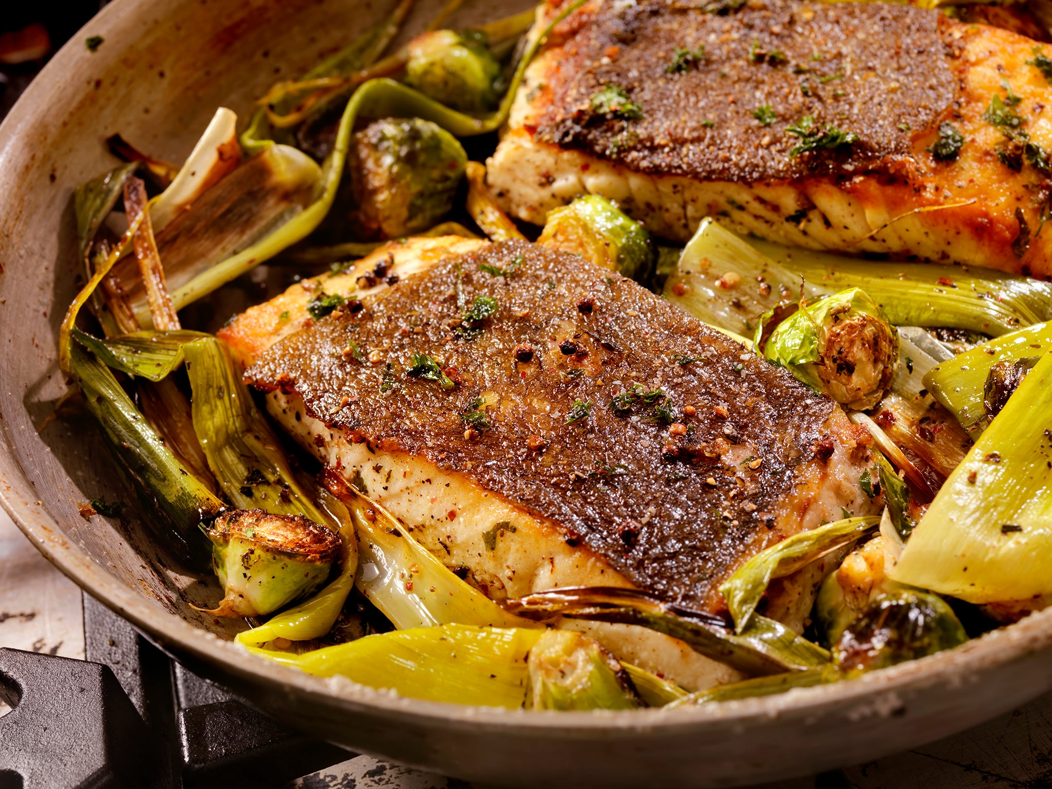 Make this as weeknight friendly as possible by roasting the fish and leeks in the same pan