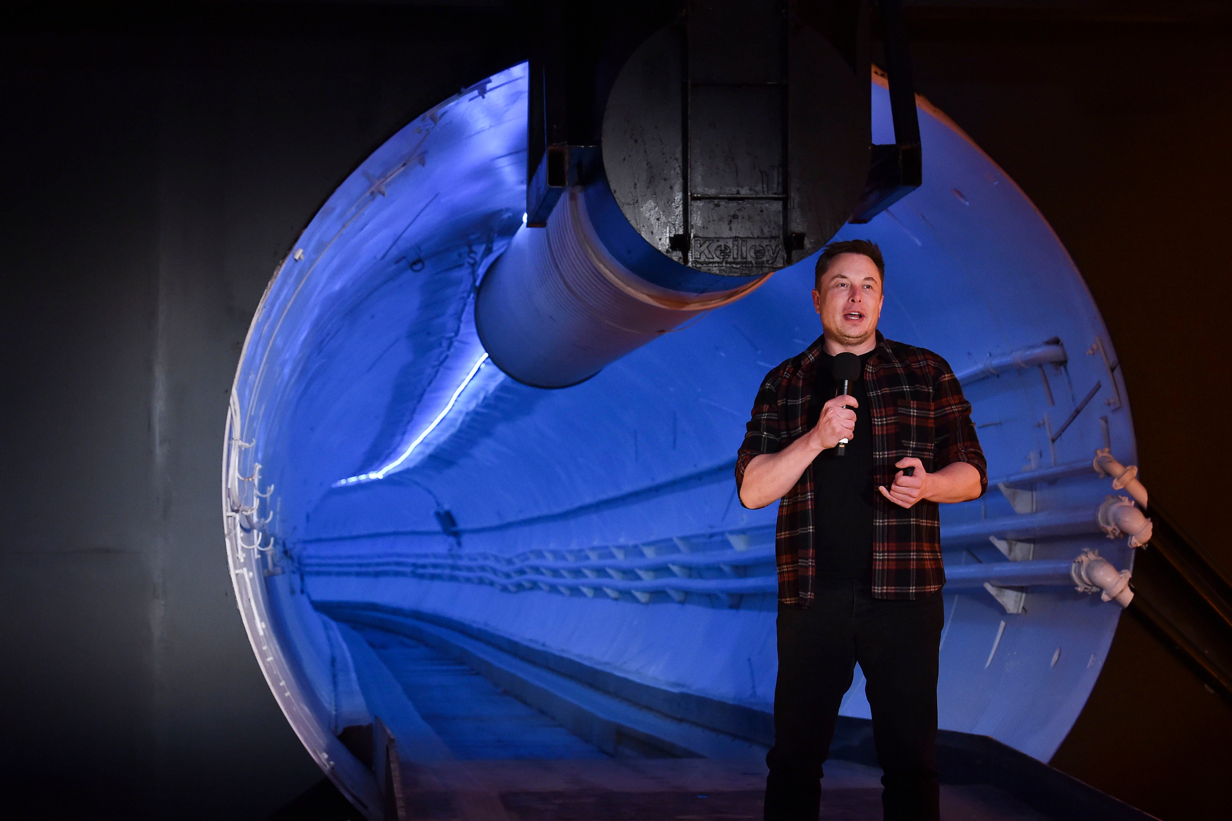 Elon Musk speaks during an unveiling event for the Boring Company test tunnel in Hawthorne, California, on Tuesday, 18 December, 2018