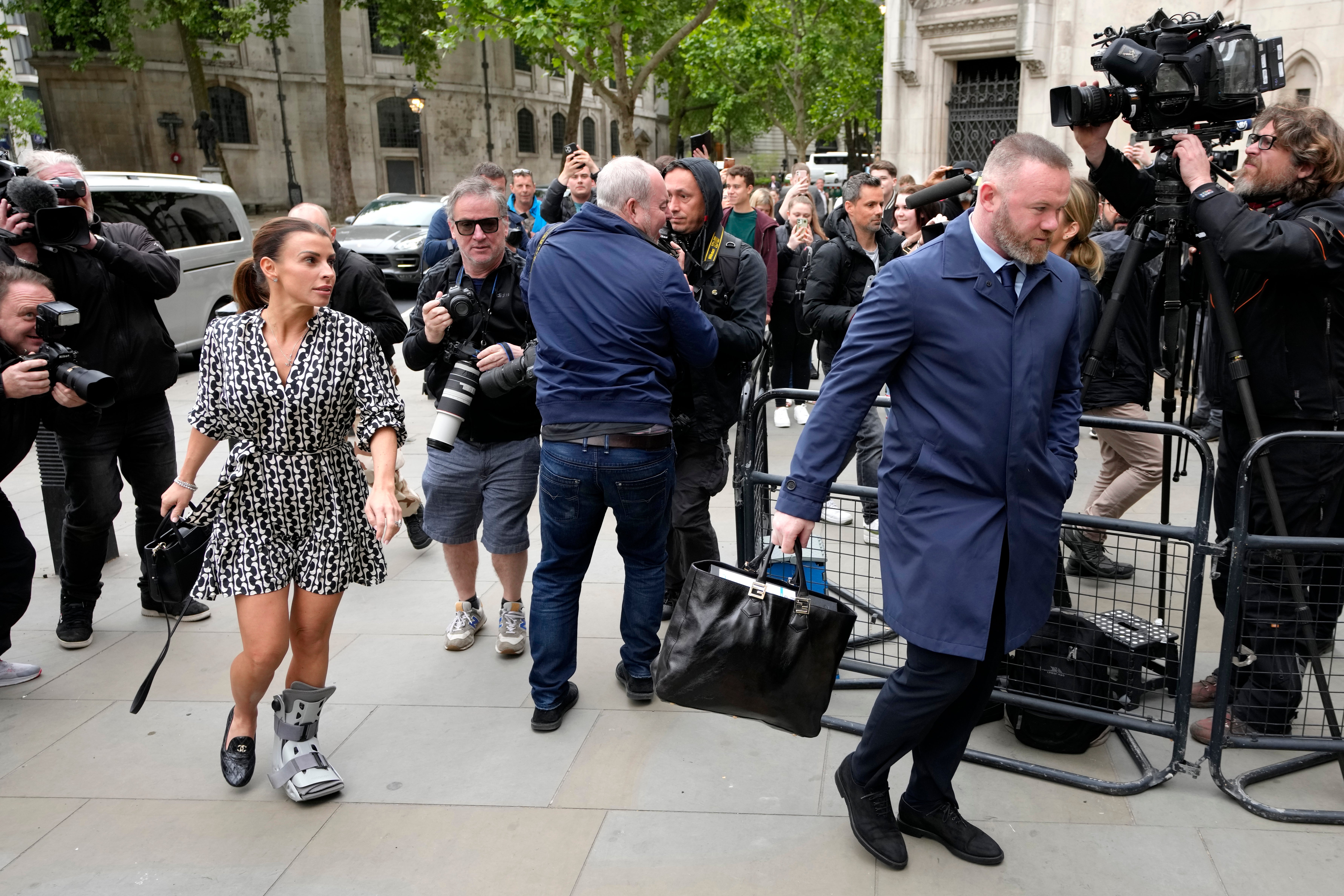 Coleen and Wayne Rooney arrive at the High Court for day two