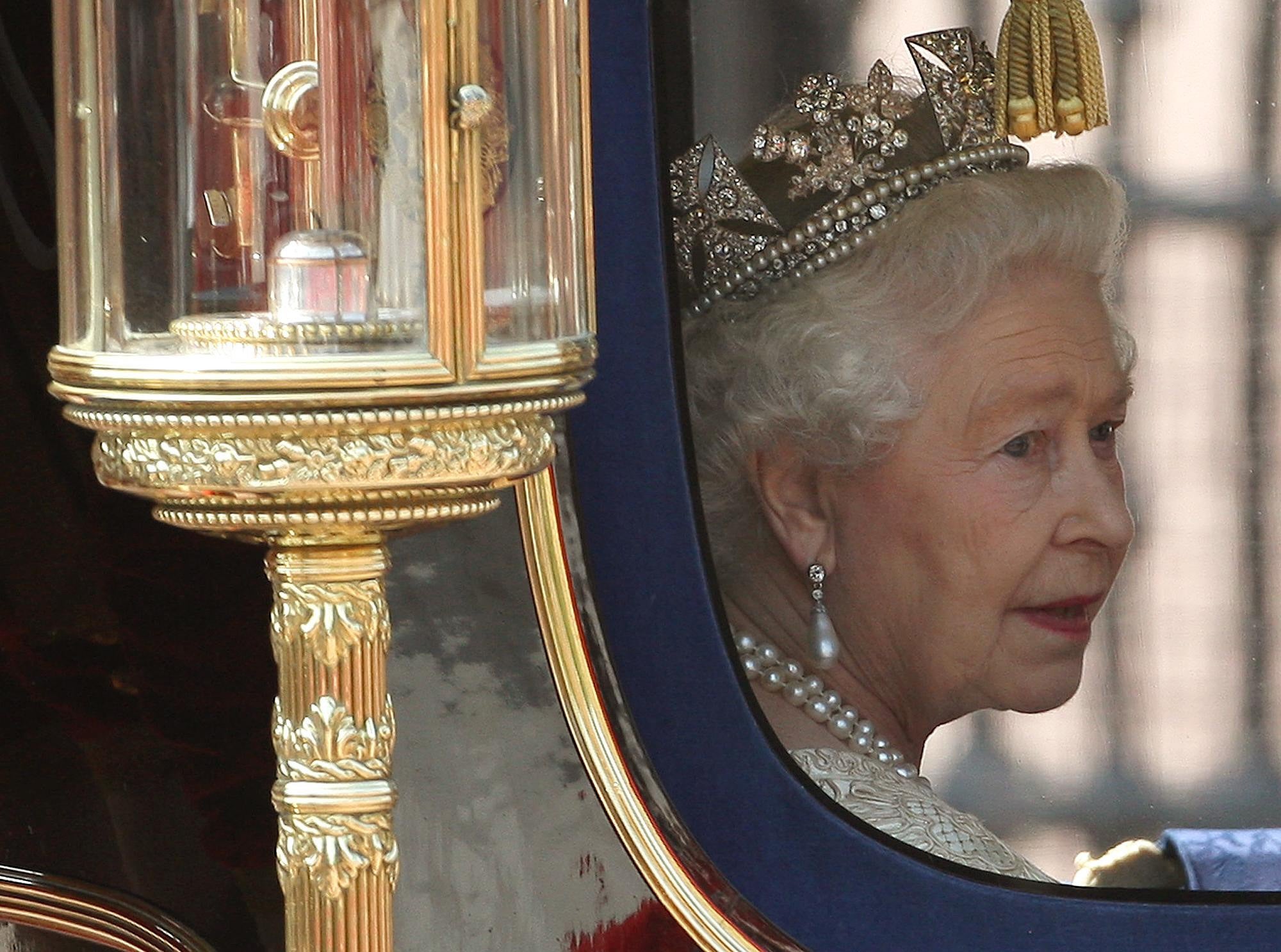 The Queen wearing the Diadem as she returns to Buckingham Palace after the State Opening of Parliament in 2010 (Dominic Lipinski/PA)