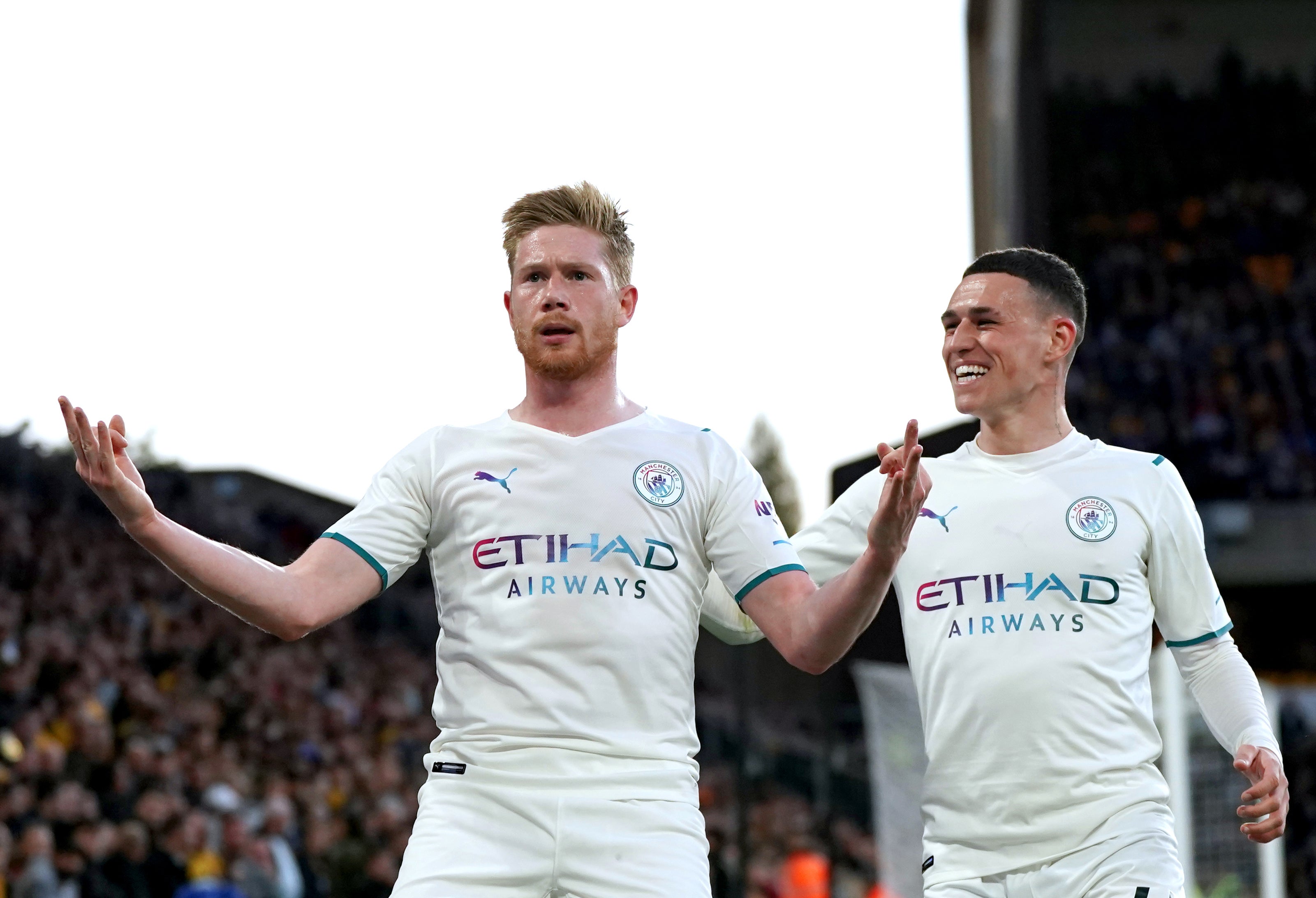 Kevin De Bruyne, left, scored four times as Manchester City thrashed Wolves to move closer to title success (Nick Potts/PA)