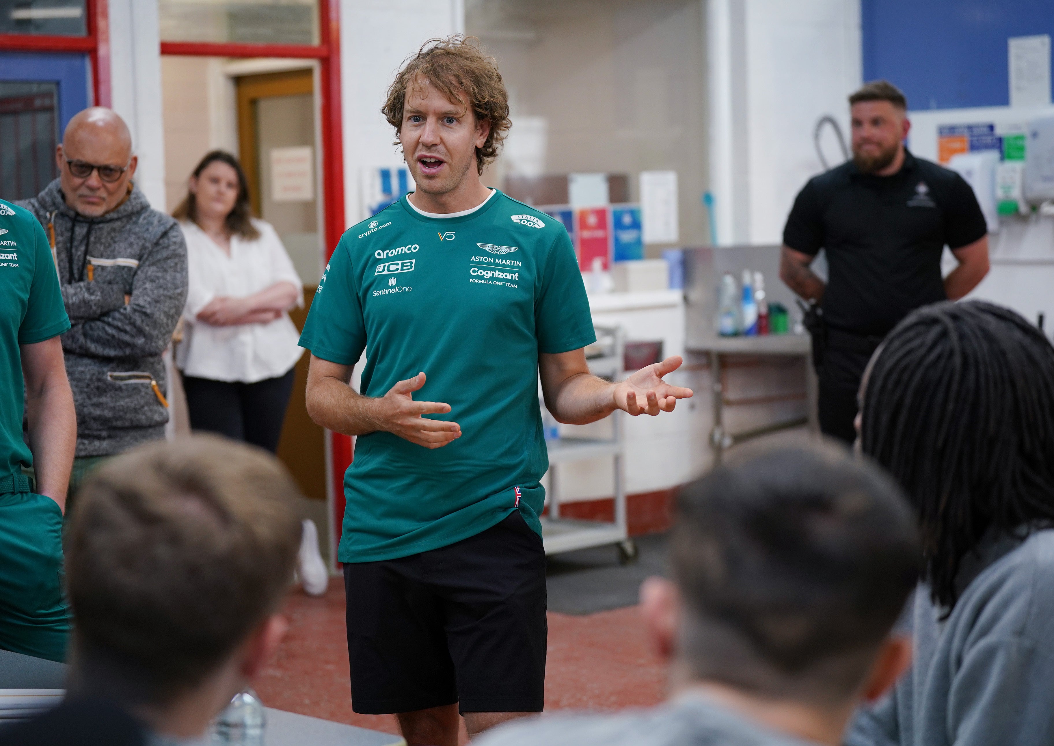 Formula 1 driver Sebastian Vettel meets young offenders during a visit to HMP Feltham (Yui Mok/PA)