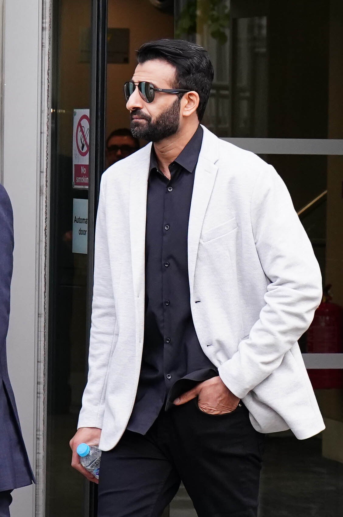 Witness Zahid Saeed leaving Capital House in Edinburgh after giving evidence for the public inquiry into the death of Sheku Bayoh (Jane Barlow/PA)