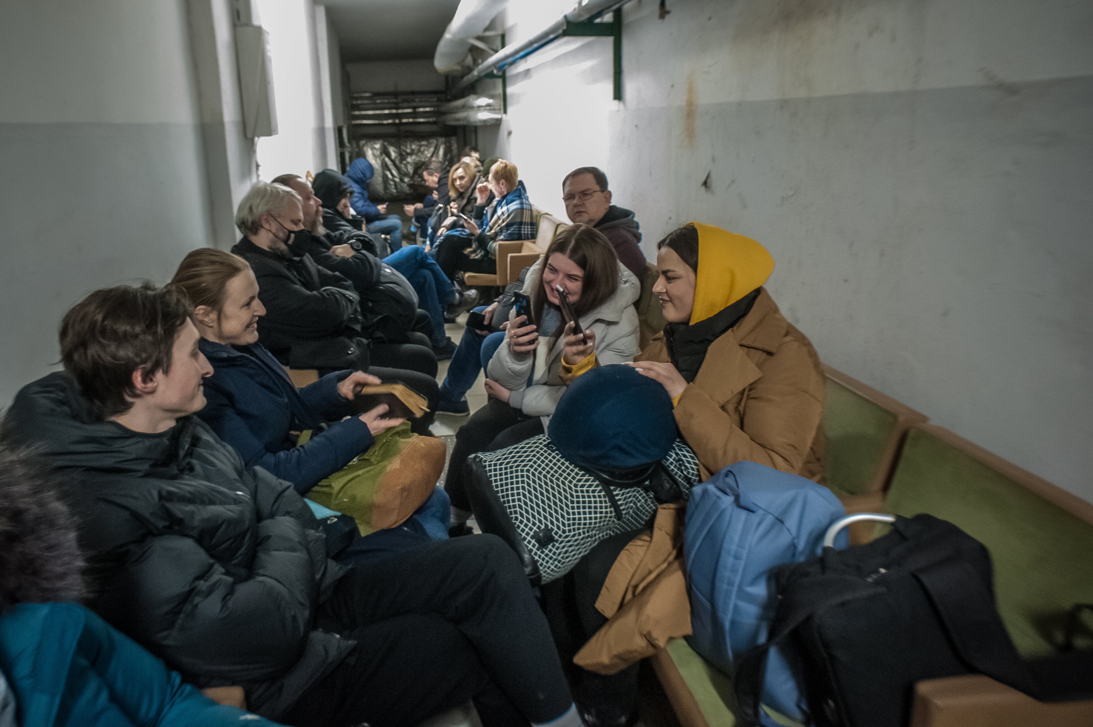 Workers of the Ukrainian public broadcasting company hide during an air raid in the basement of a Ukrainian radio house in Kyiv