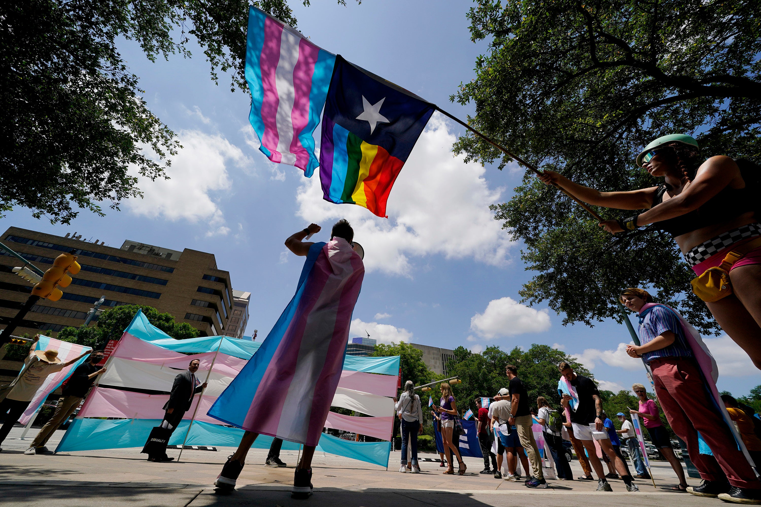 Demonstrators protest against anti-LGBTQ+ bills being rolled out in Texas at the state capitol