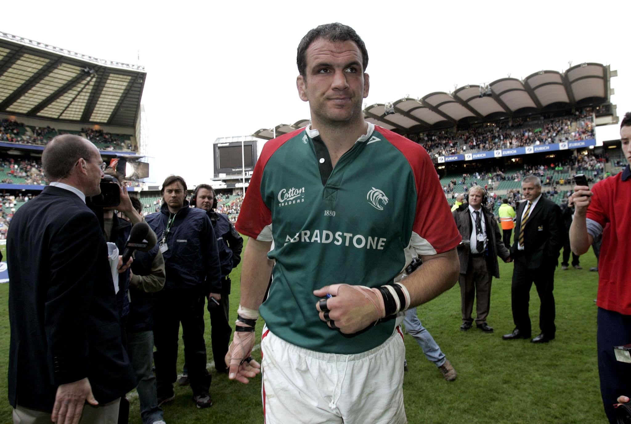 Leicester Tigers’ Martin Johnson walks from the pitch in dejection after their defeat (David Davies/PA)