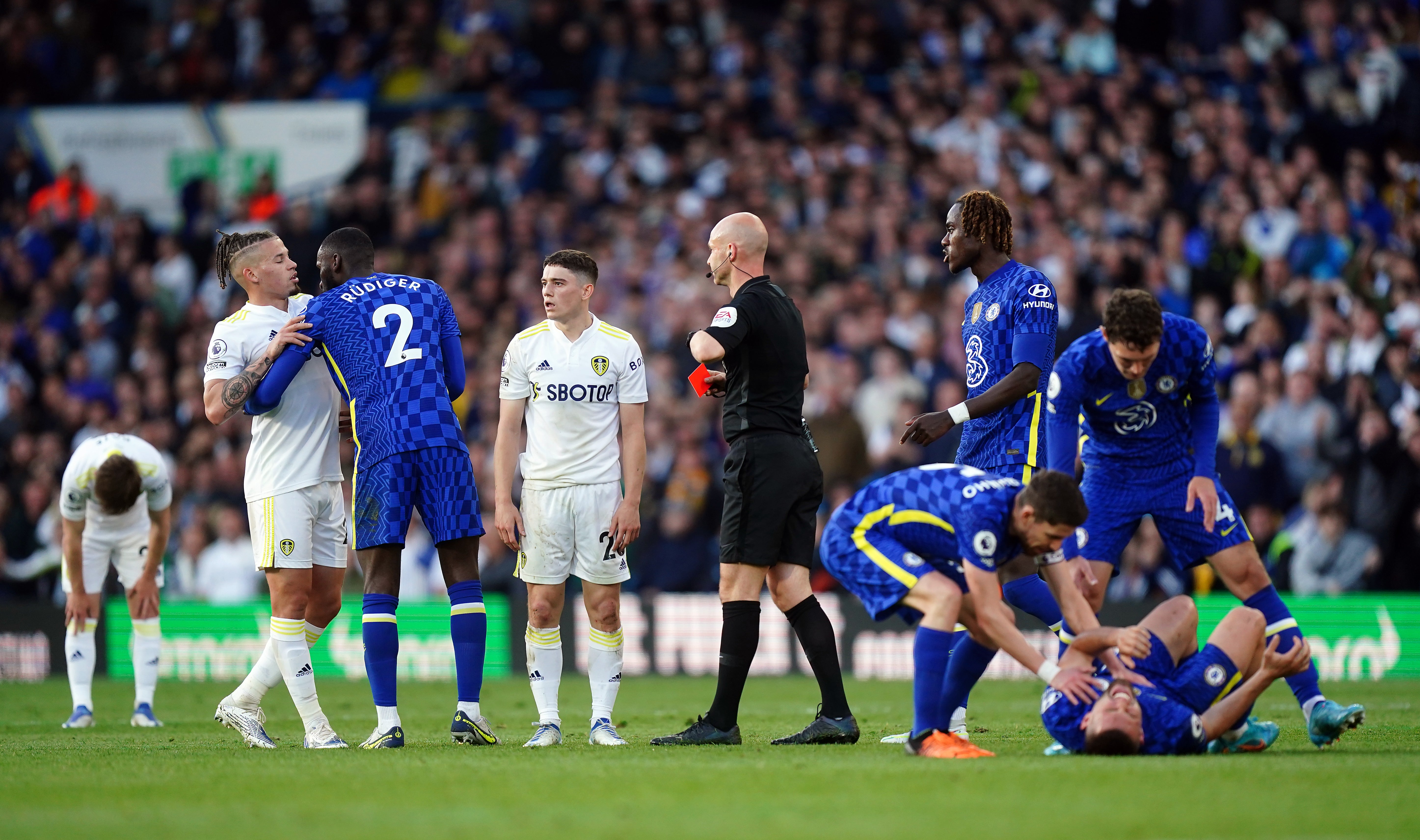 Dan James, centre left, is shown a straight red card during Leeds’ midweek defeat to Chelsea (Mike Egerton/PA)