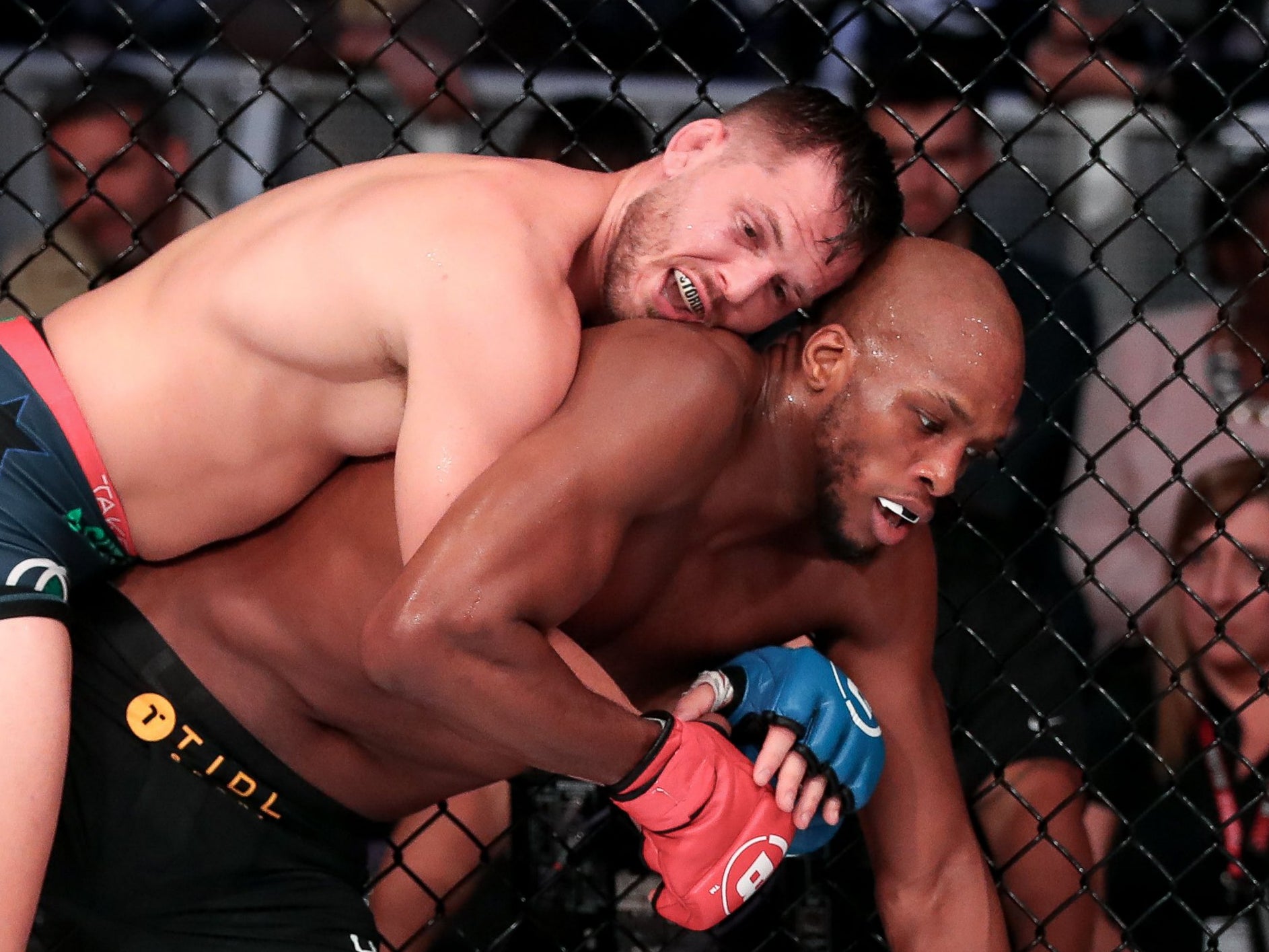 Logan Storley (left) wrestled throughout the main event to claim the interim title at 170lbs